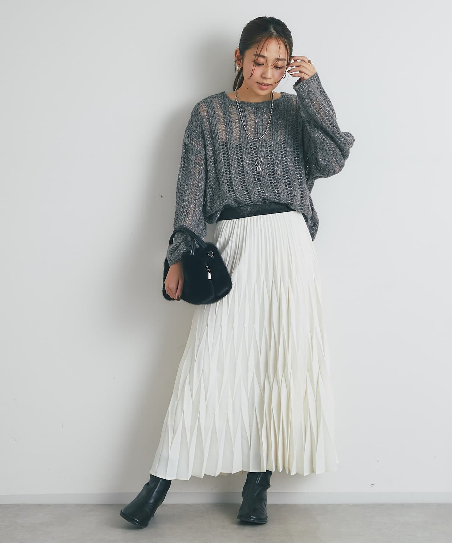 un dix cors(アンディコール) 《上品なリラックス感》ラメリリヤーン針抜きニット