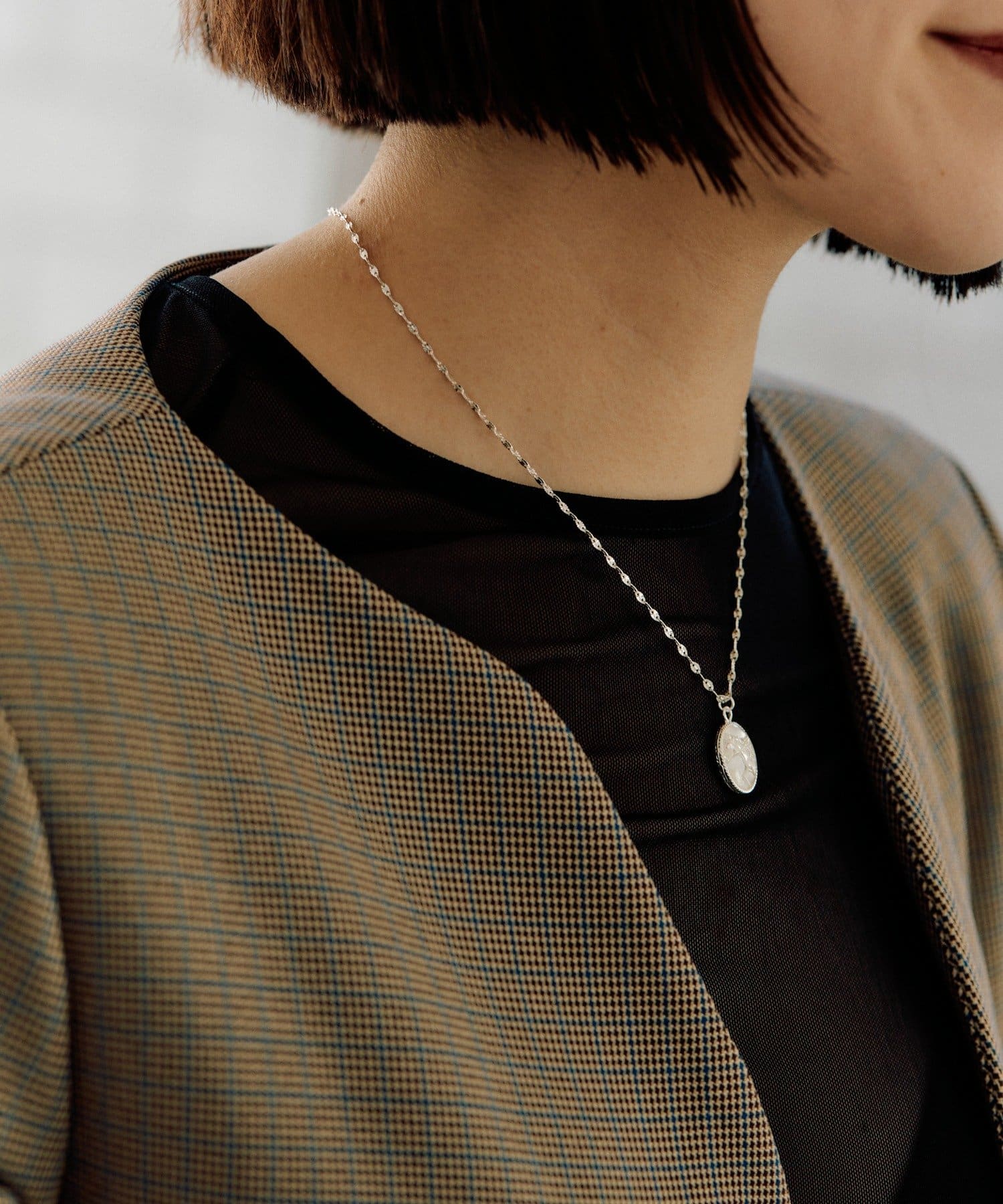 ear PAPILLONNER(イア パピヨネ) ホースエポコインネックレス