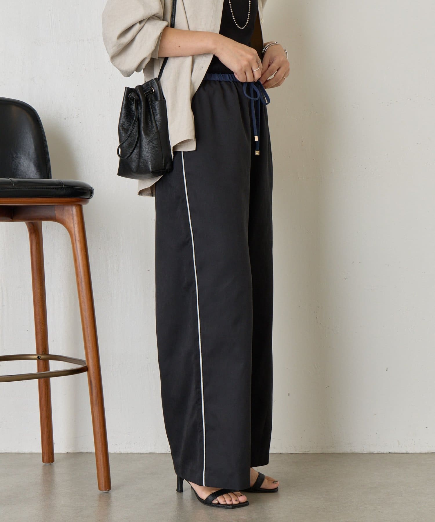 Jena　espace merveilleux(ジェナ　エスパスメルヴェイユ) 配色ラメラインパンツ