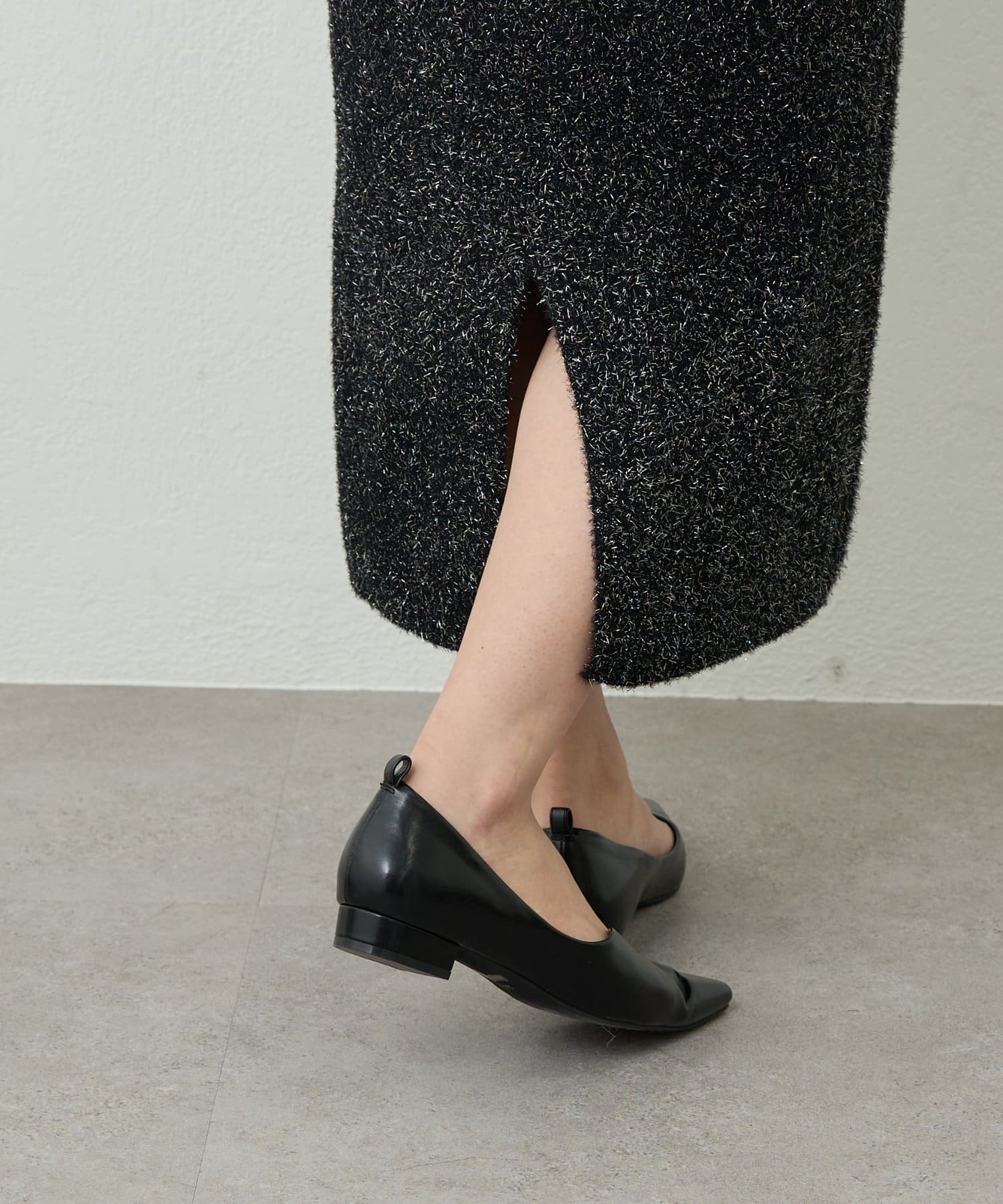 un dix cors(アンディコール) 《華やぎをプラス》フィルムラメニットタイトスカート