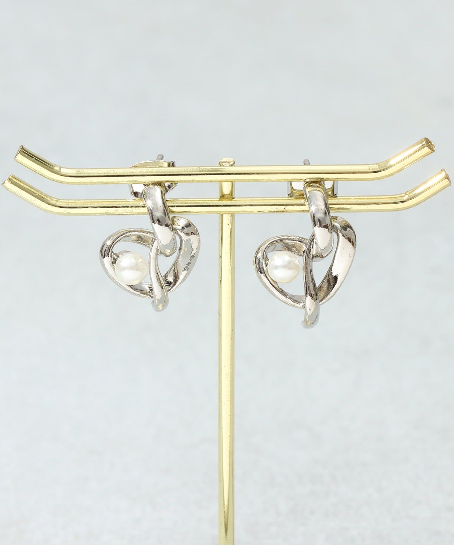 3COINS(スリーコインズ) パールアミハートメタルピアス