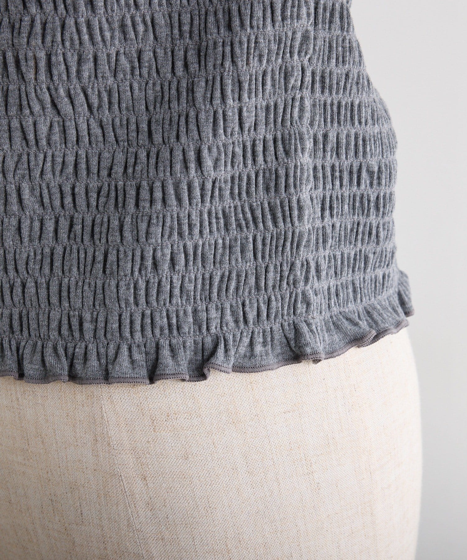 one after another NICE CLAUP(ワンアフターアナザー ナイスクラップ) 長袖シャーリング肩リボントップス