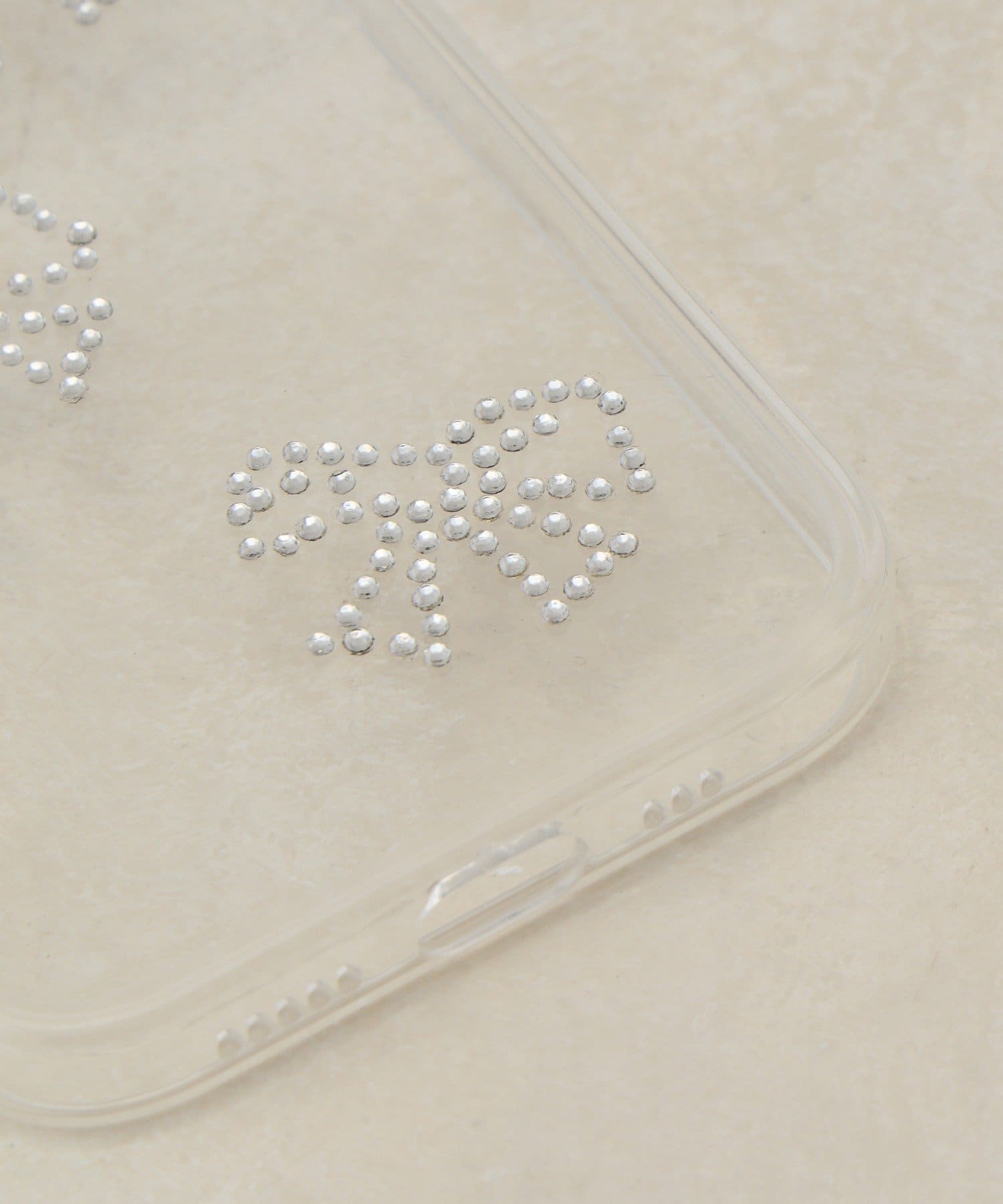 Lattice(ラティス) ストーンリボンスマホケース(iPhone15)