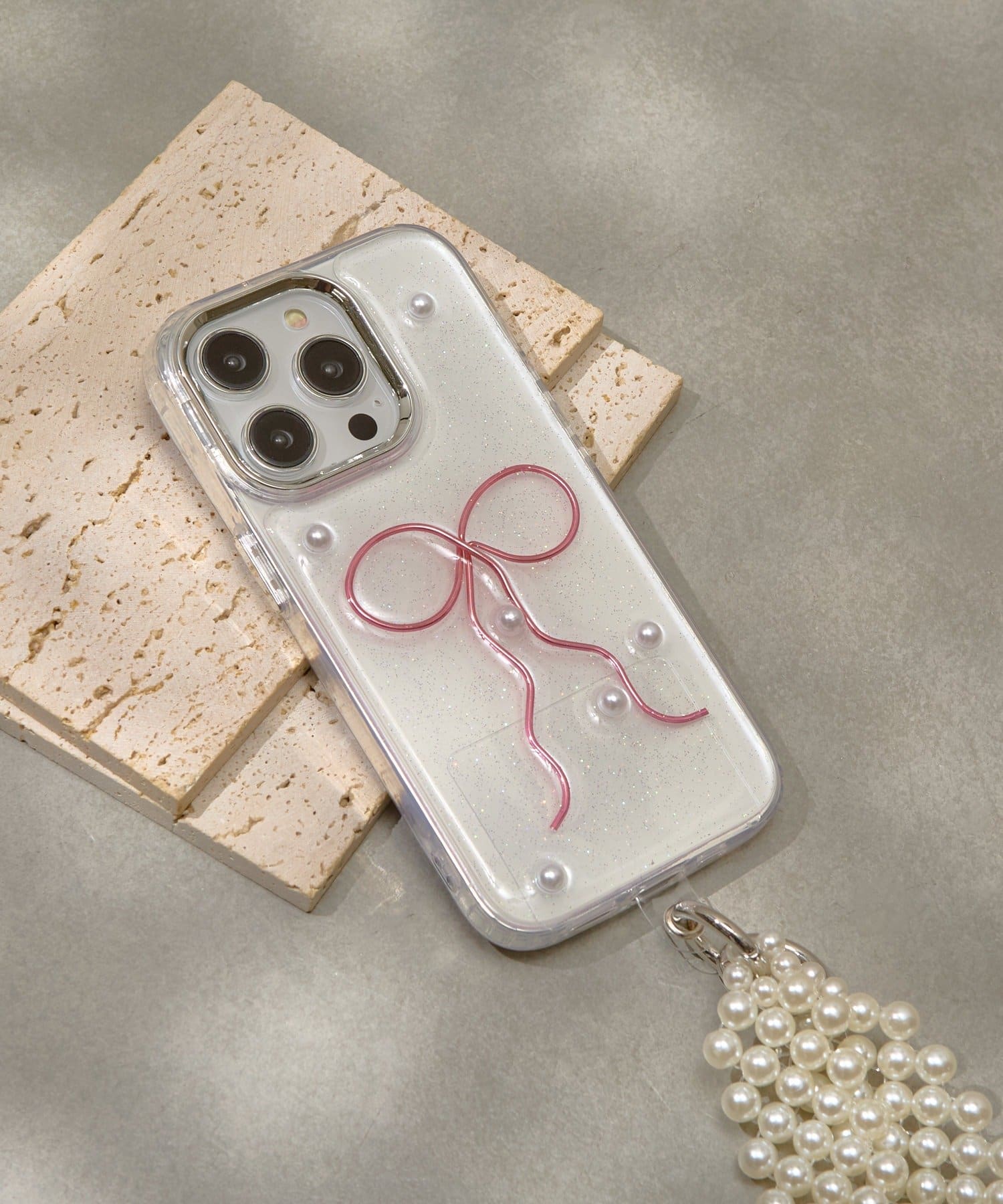 Lattice(ラティス) パールリボンスマホケース(iPhone14pro)