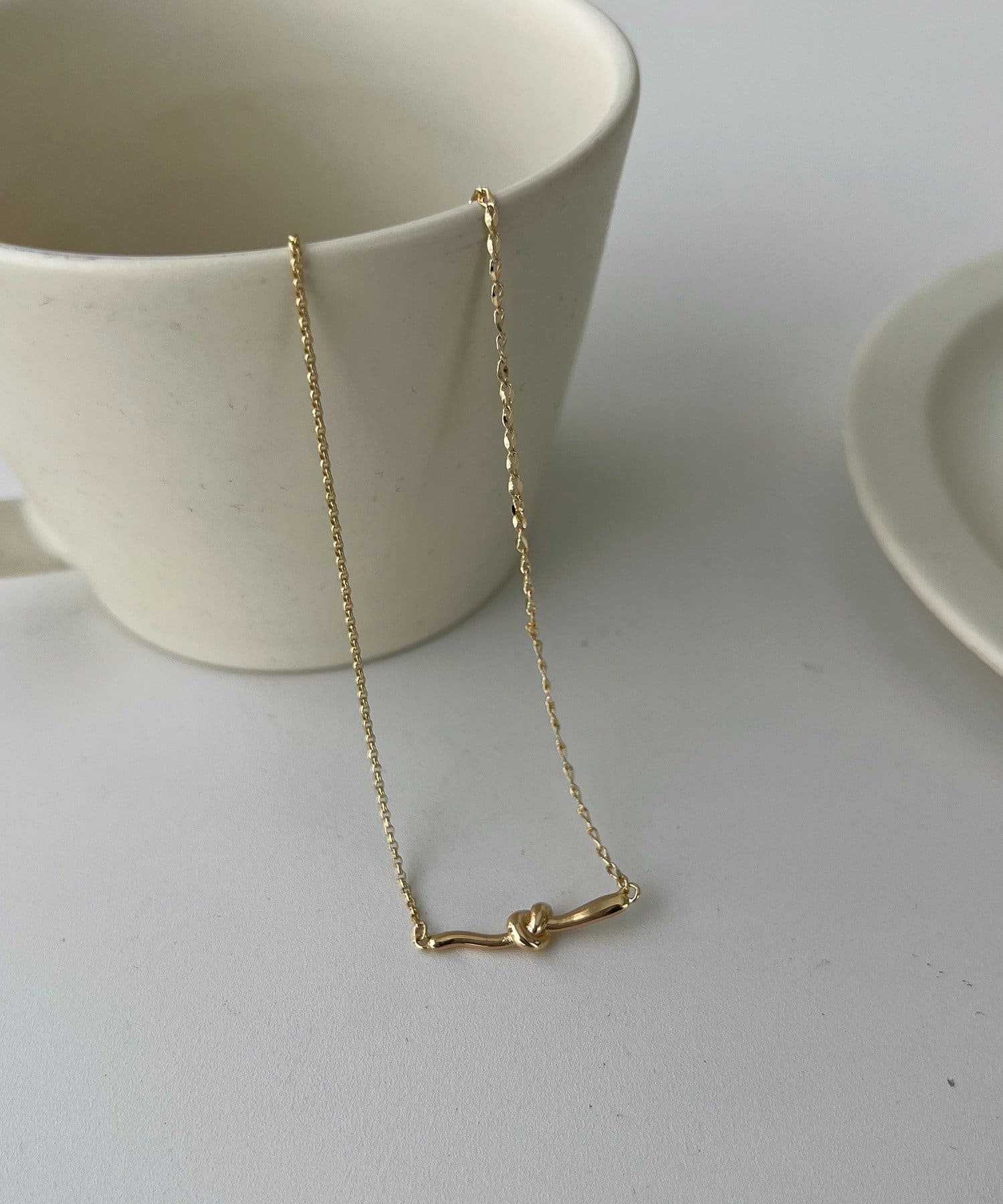 CAPRICIEUX LE'MAGE(カプリシュレマージュ) 〈GOLDY/ゴールディ〉ノットバーネックレス
