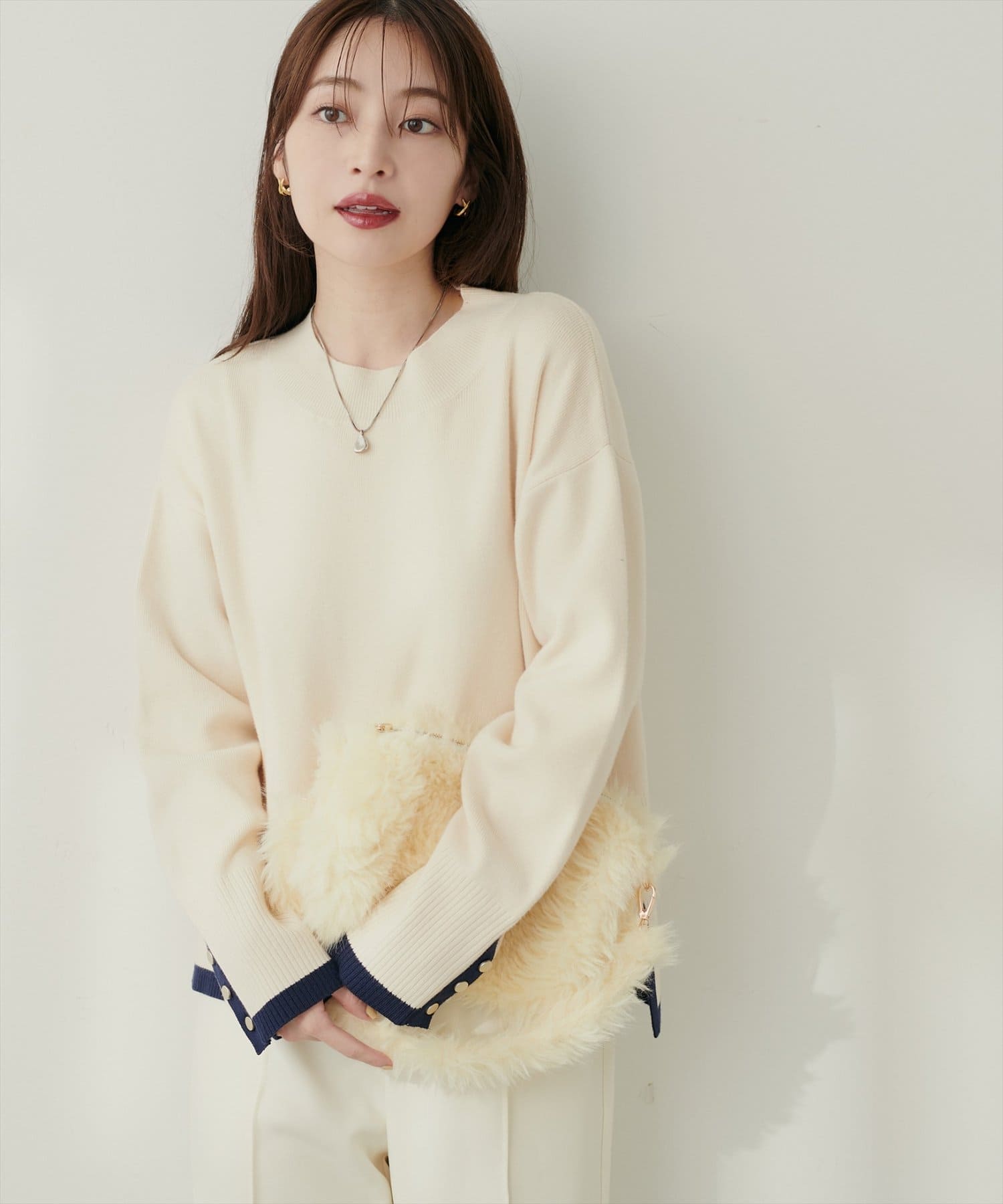 natural couture(ナチュラルクチュール) スタンドネック袖口釦ゆるニット
