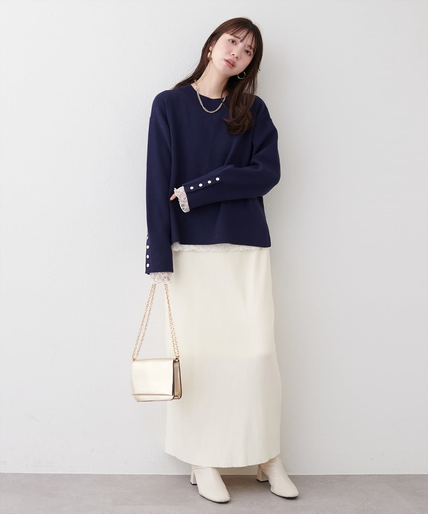 natural couture(ナチュラルクチュール) スタンドネック袖口釦ゆるニット