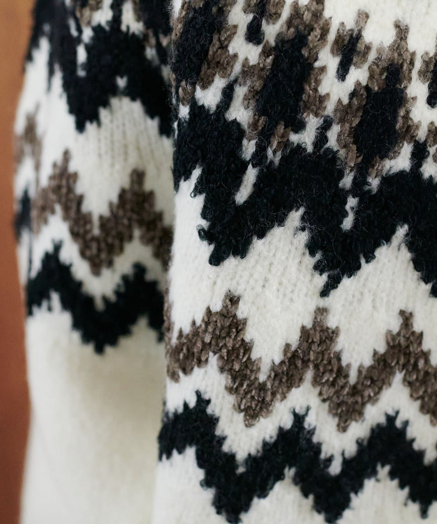 DISCOAT(ディスコート) 【暖かおしゃれ見え/ユニセックス】求心柄オーバーニット