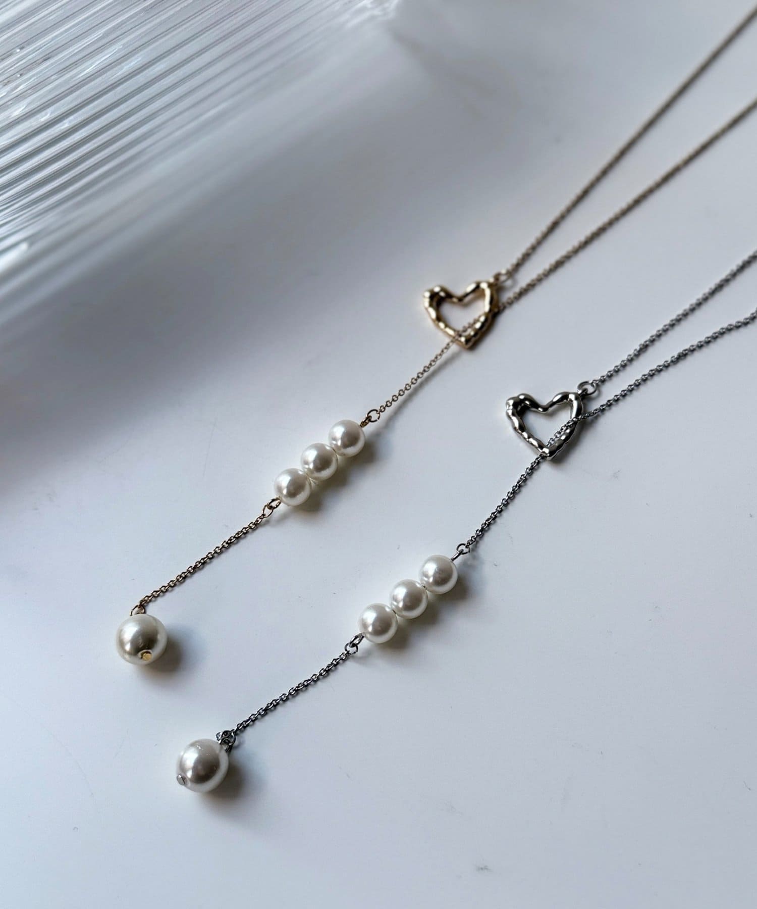 Chez toi(シェトワ) ハートとパールロングネックレス