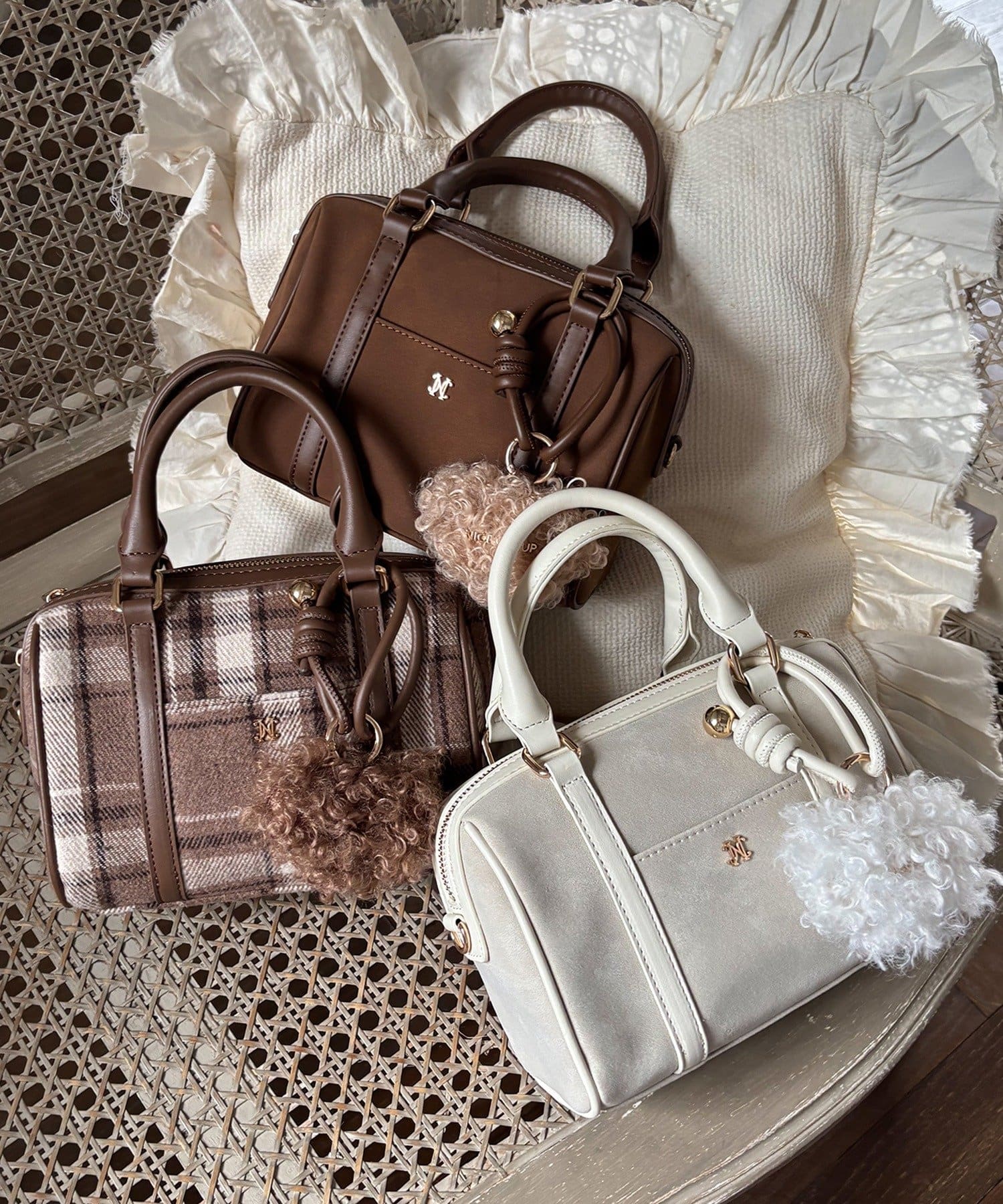 one after another NICE CLAUP(ワンアフターアナザー ナイスクラップ) ハートチャーム付きミニボストン