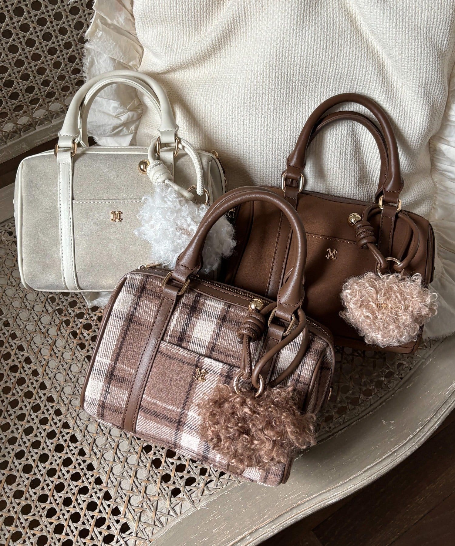 one after another NICE CLAUP(ワンアフターアナザー ナイスクラップ) ハートチャーム付きミニボストン