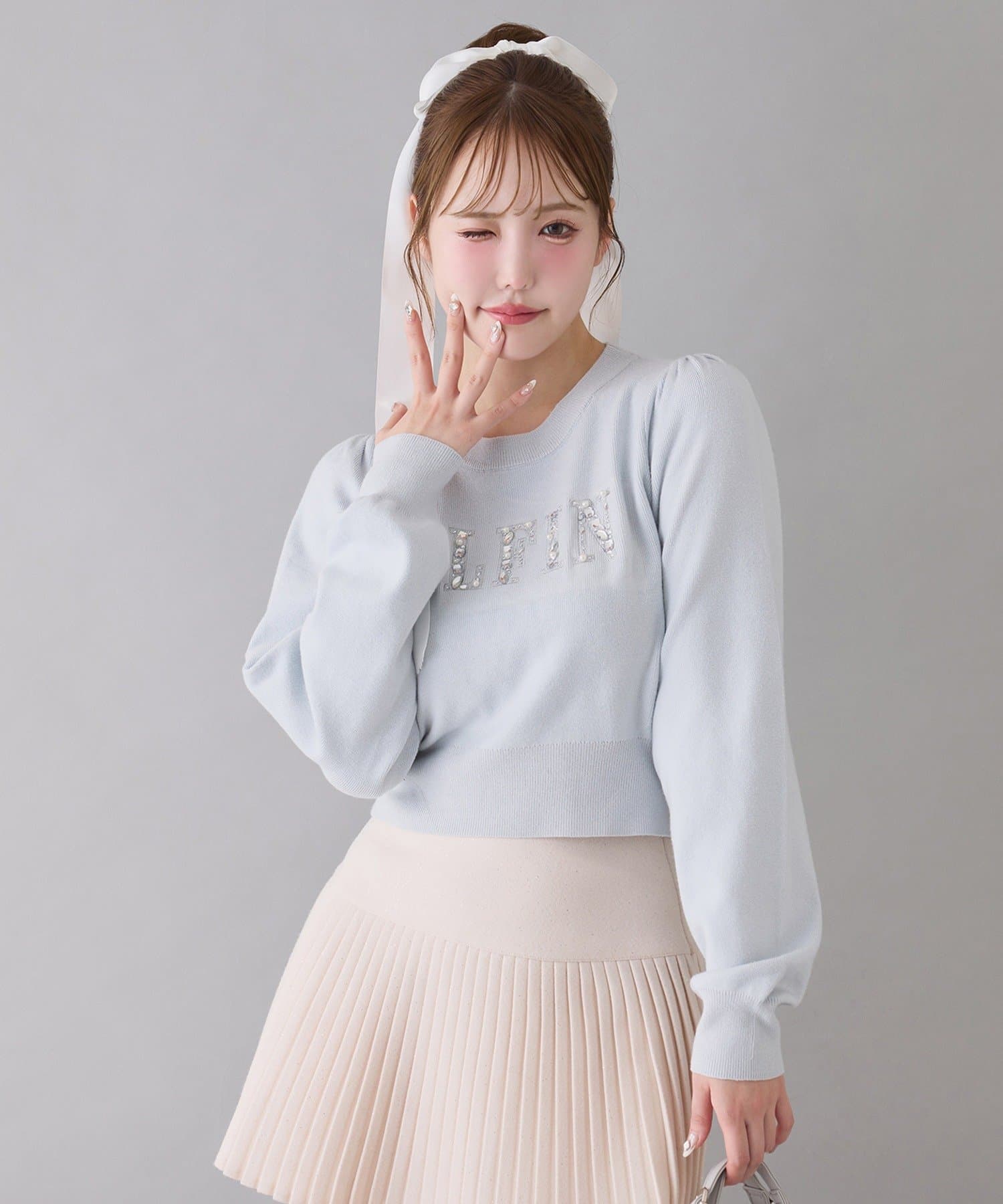 one after another NICE CLAUP(ワンアフターアナザー ナイスクラップ) キラキラビジューロゴニット