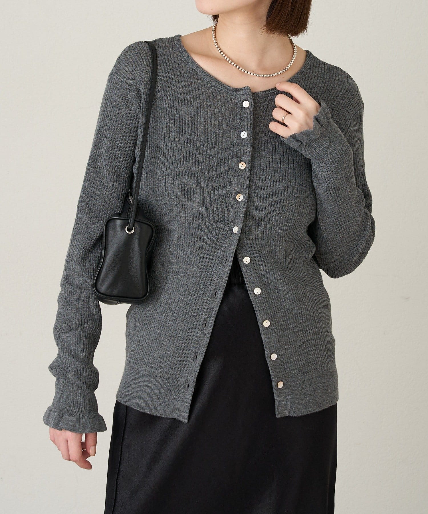 Omekashi(オメカシ) 2WAYフリルリブニットカーディガン