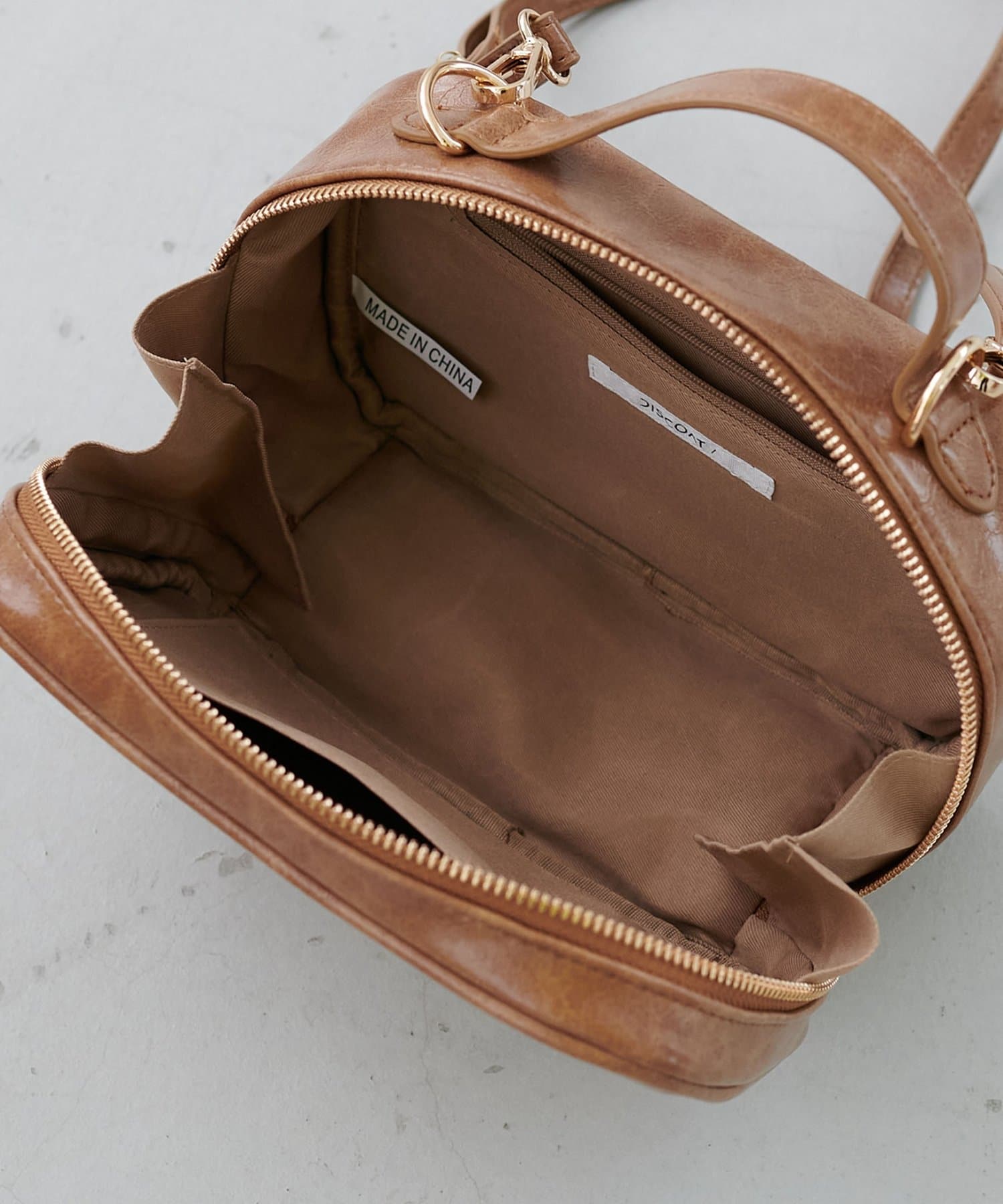 DISCOAT(ディスコート) フロントオープンカメラショルダーバッグ