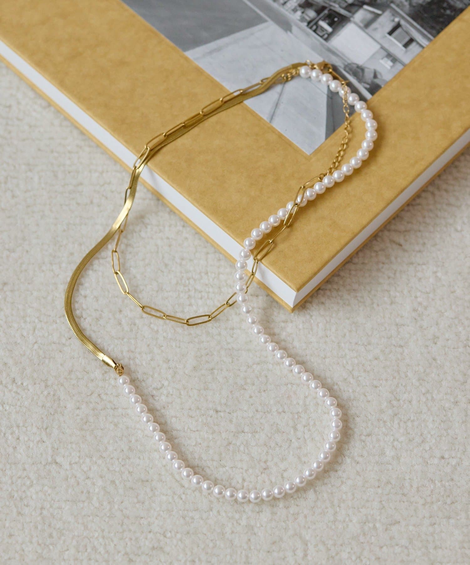 ear PAPILLONNER(イア パピヨネ) 《金属アレルギー対応/ステンレス》ロングパールネックレス