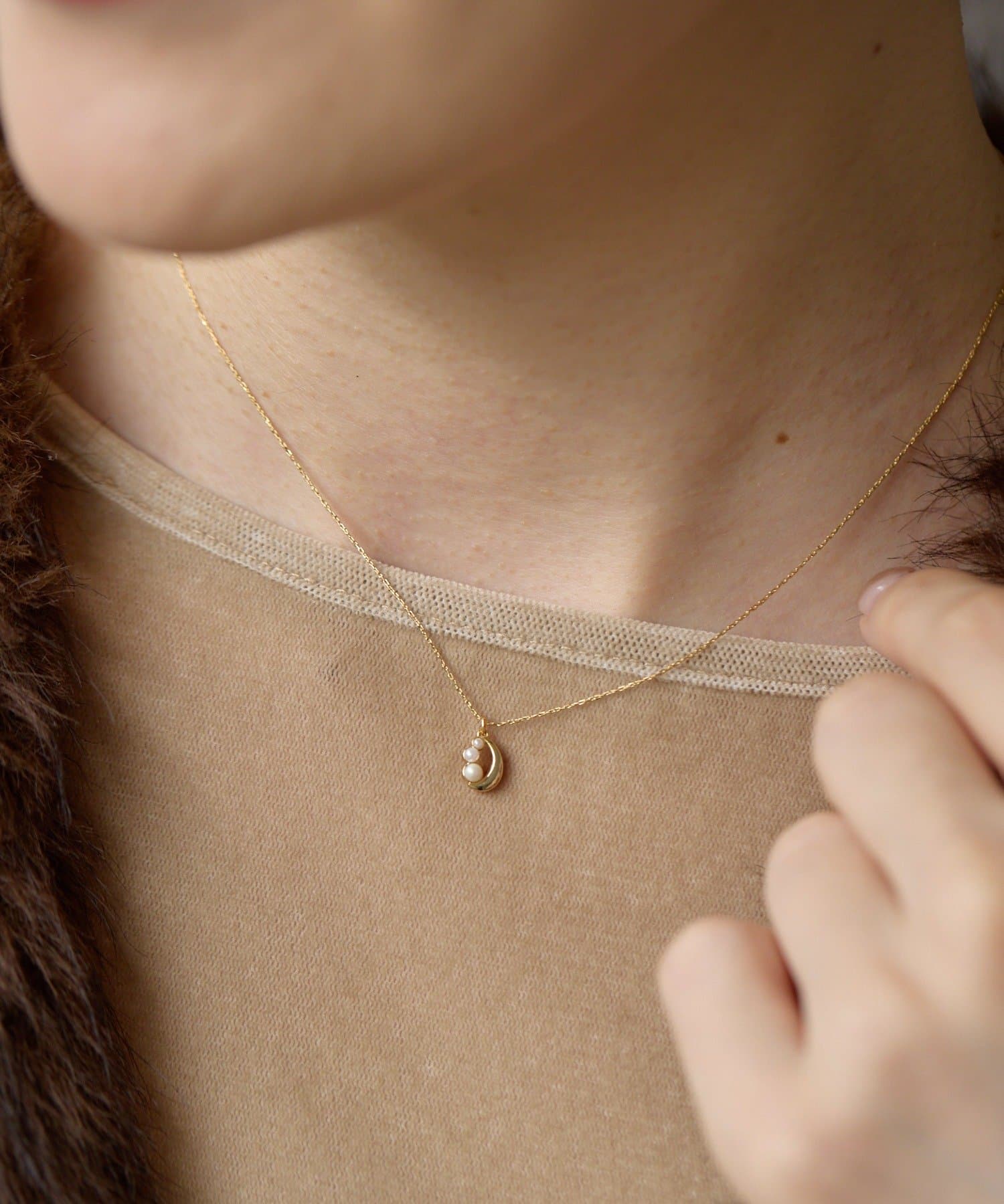 ear PAPILLONNER(イア パピヨネ) スリーパールネックレス