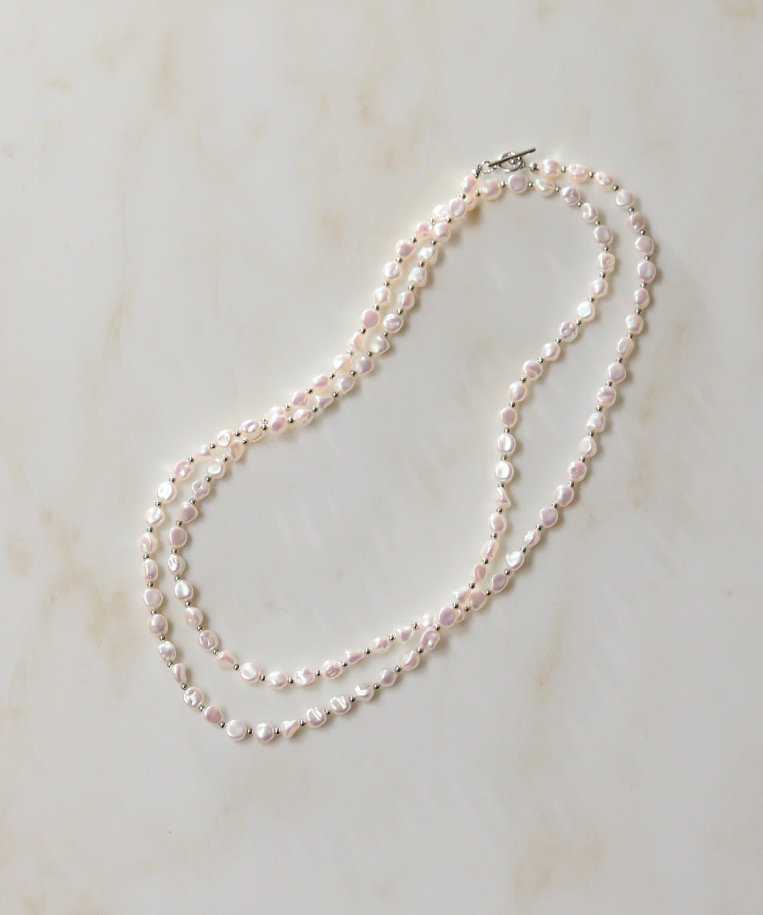 ear PAPILLONNER(イア パピヨネ) 粒バロックパールロングネックレス