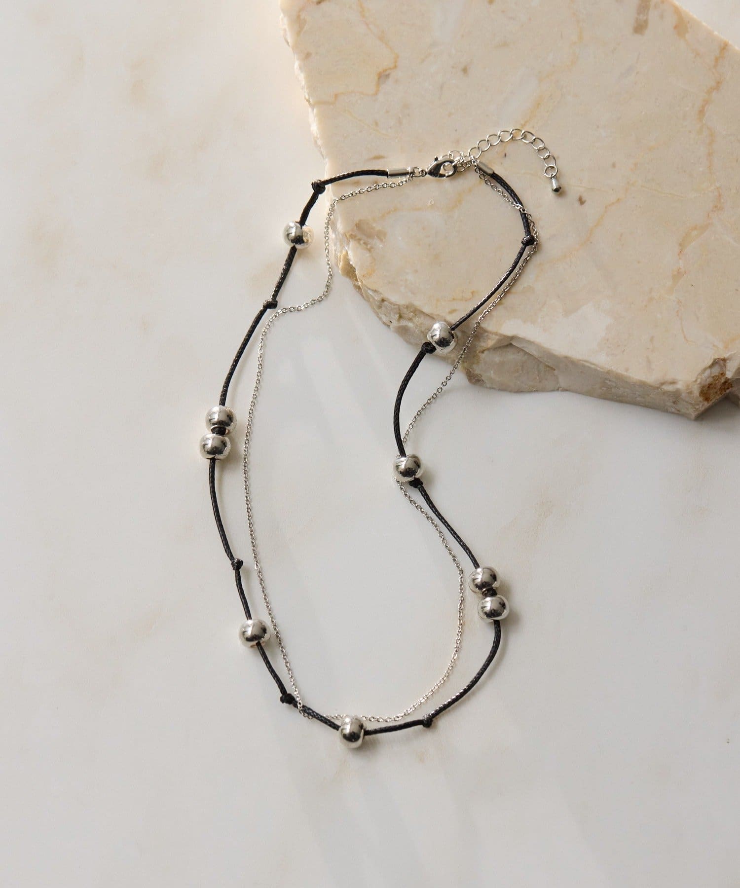 ear PAPILLONNER(イア パピヨネ) ボール2連コードネックレス