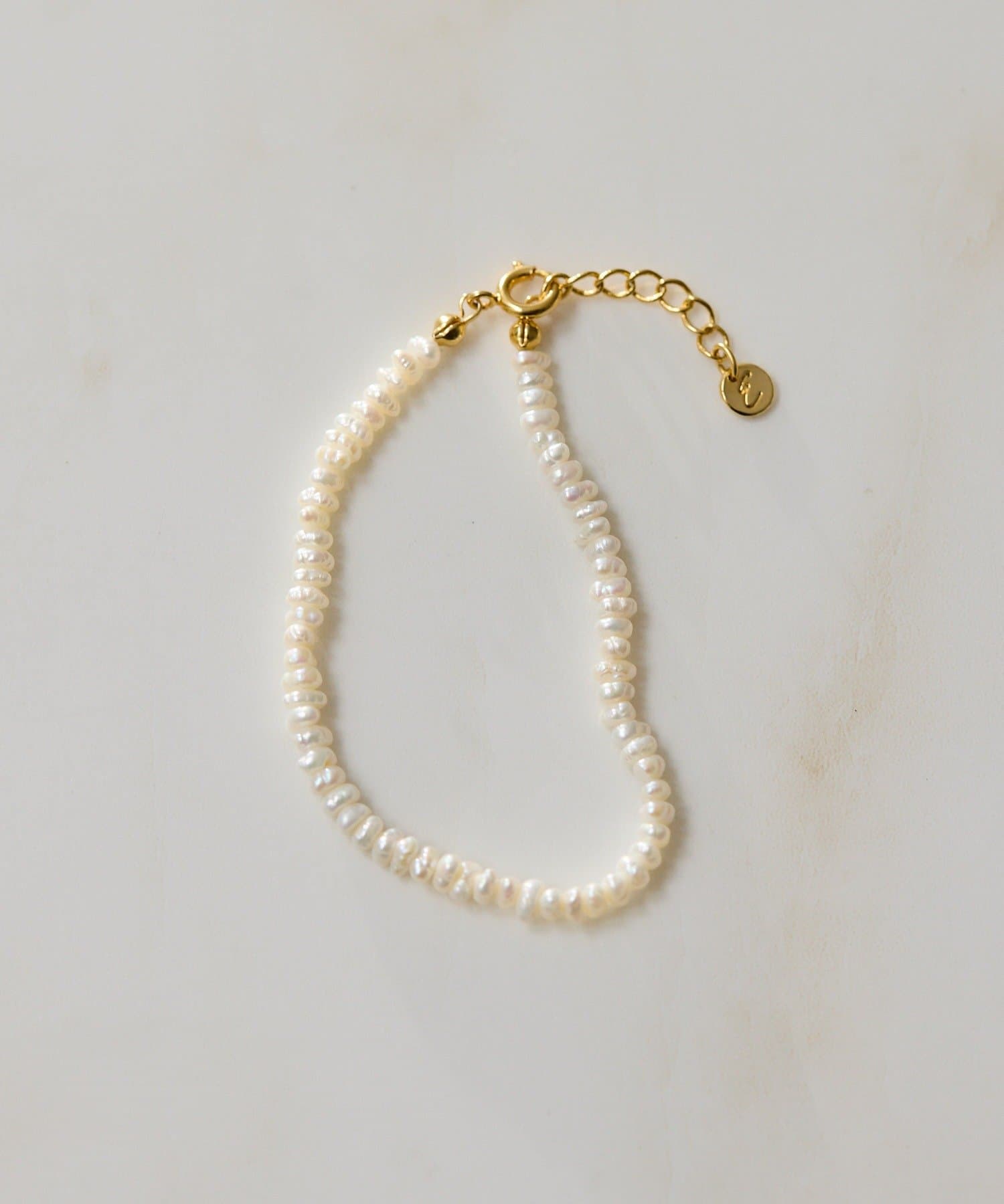 ear PAPILLONNER(イア パピヨネ) ミニ淡水パールブレスレット