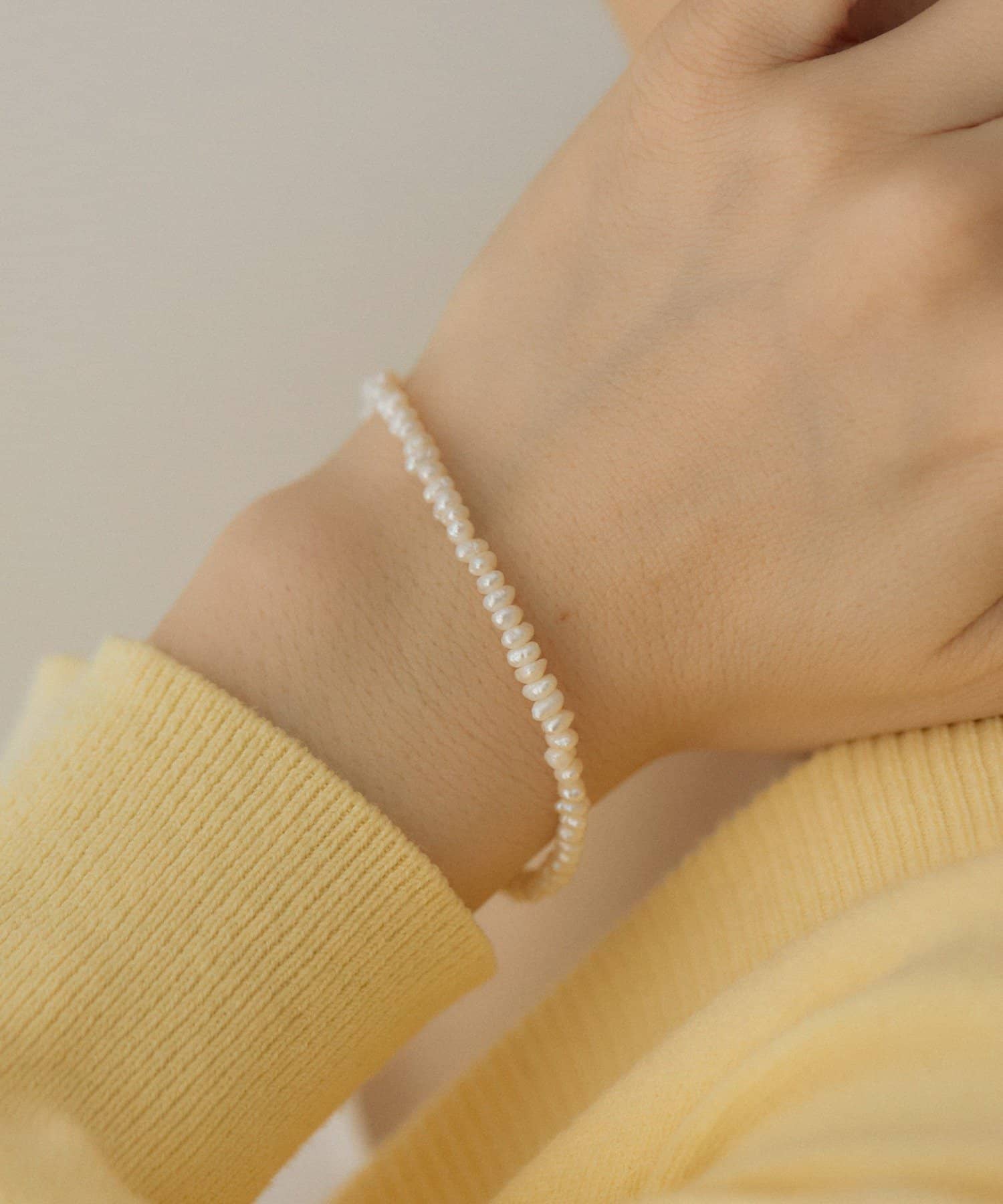 ear PAPILLONNER(イア パピヨネ) ミニ淡水パールブレスレット