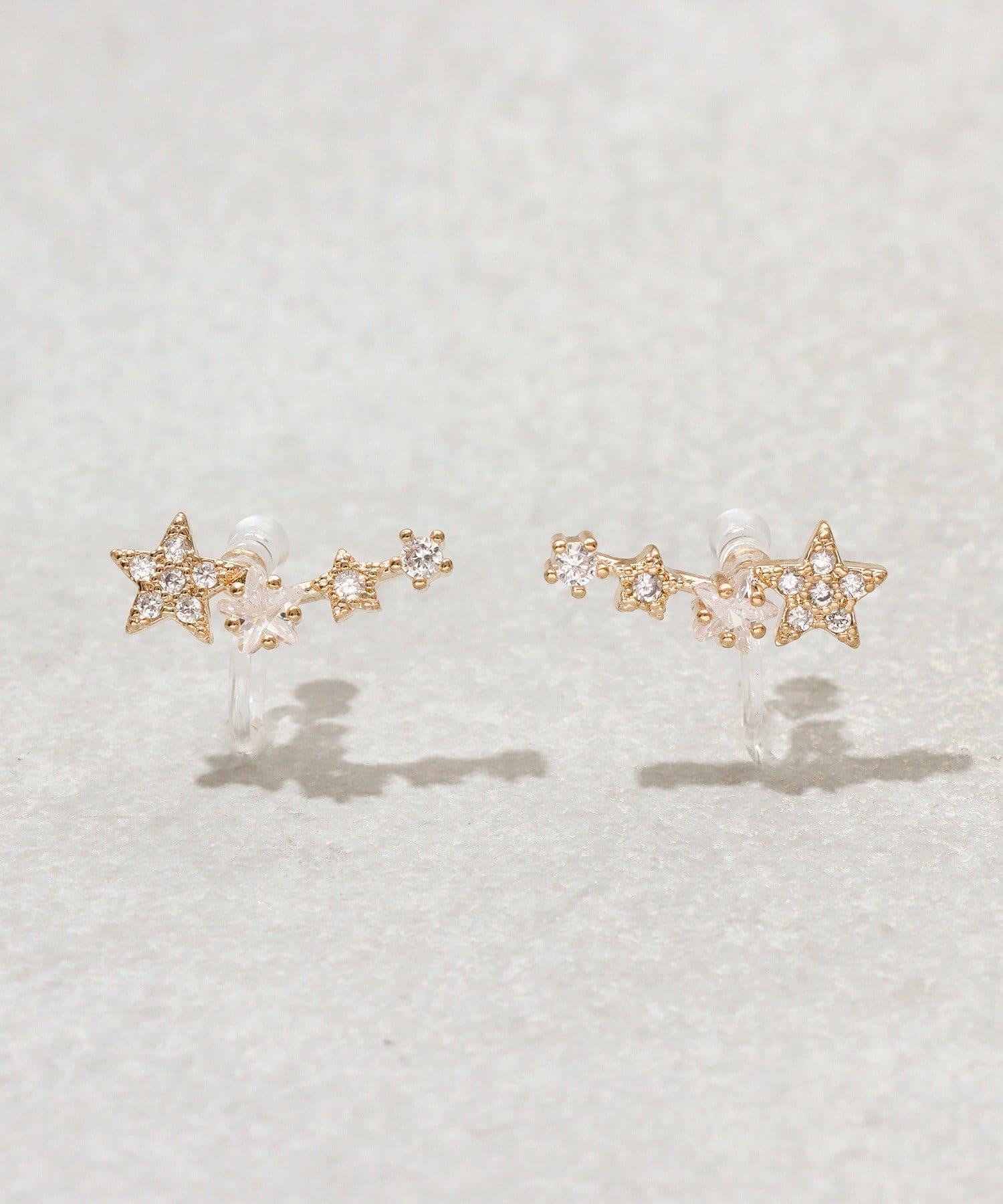 3COINS(スリーコインズ) 連スター樹脂イヤリング