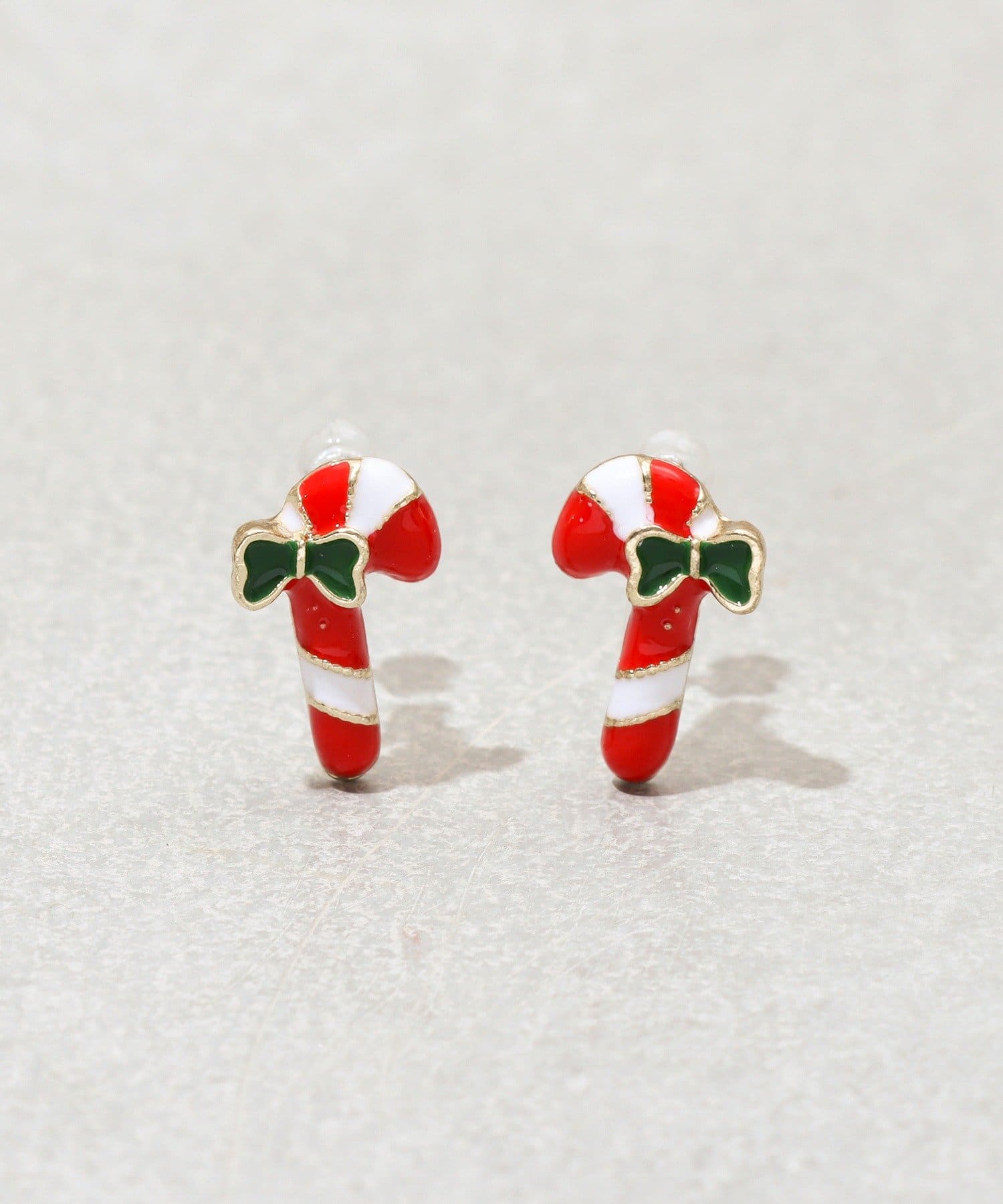 3COINS(スリーコインズ) キャンディケイン樹脂イヤリング