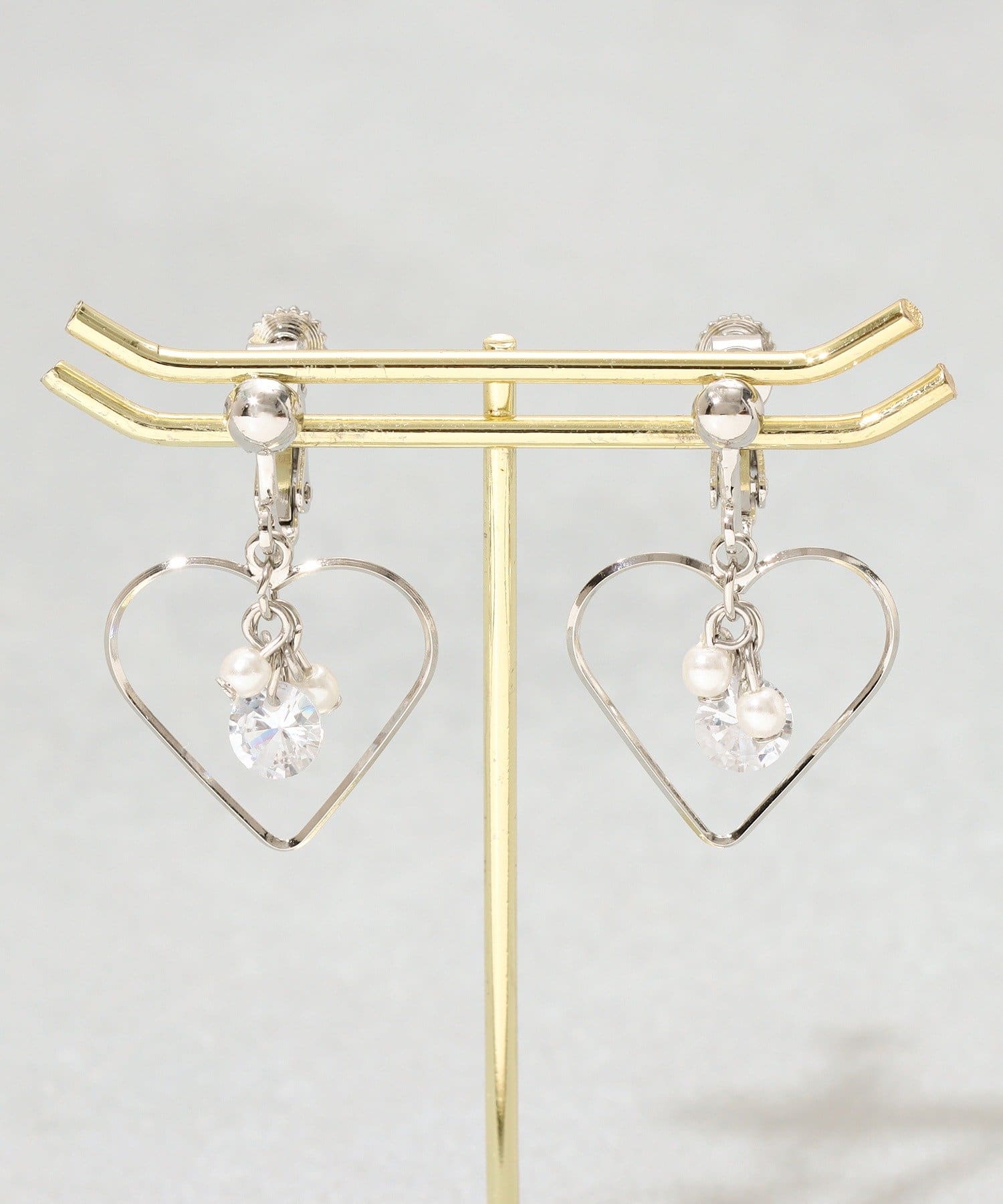 3COINS(スリーコインズ) ハートインパーツイヤリング