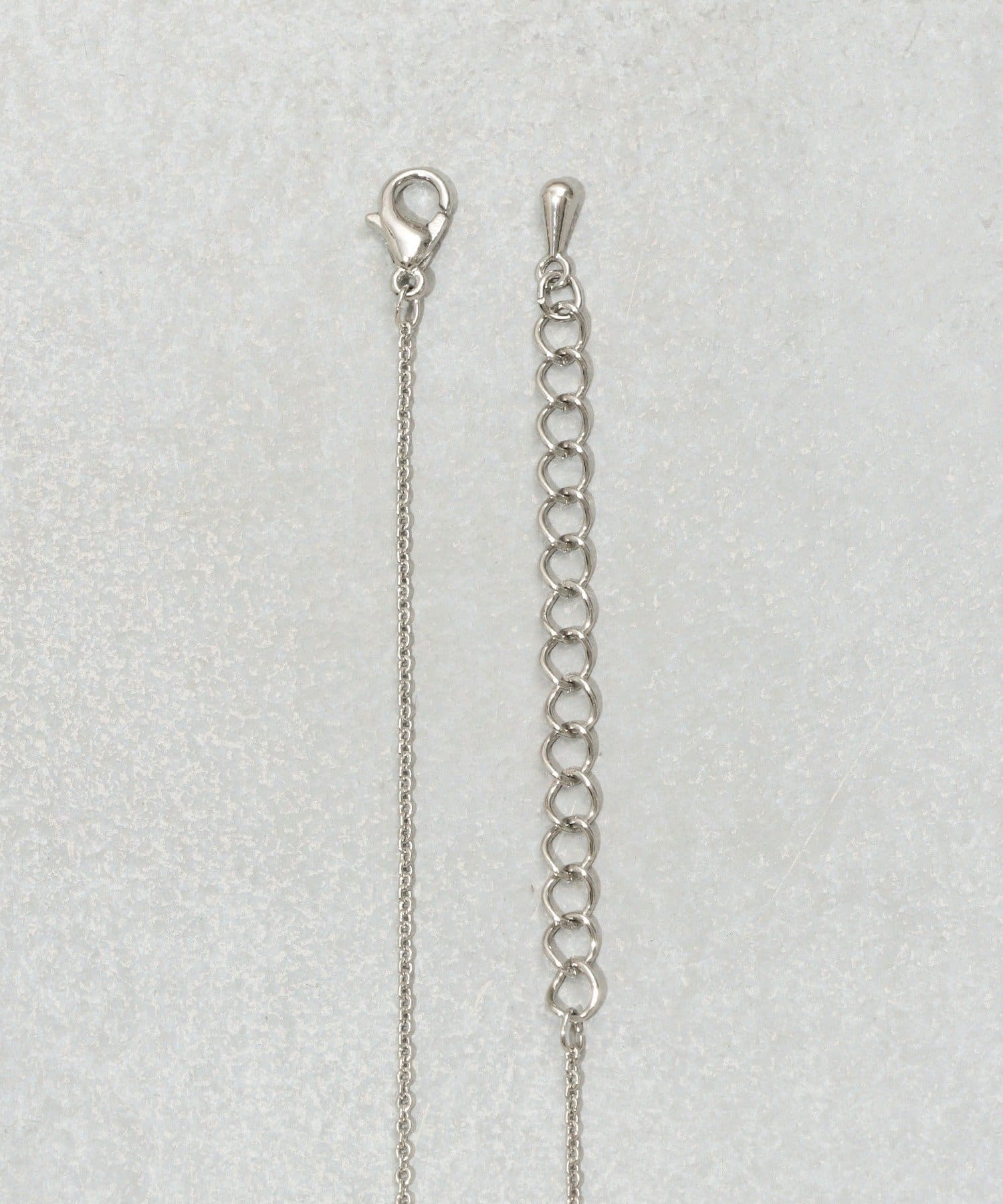 3COINS(スリーコインズ) ケッショウロングネックレス