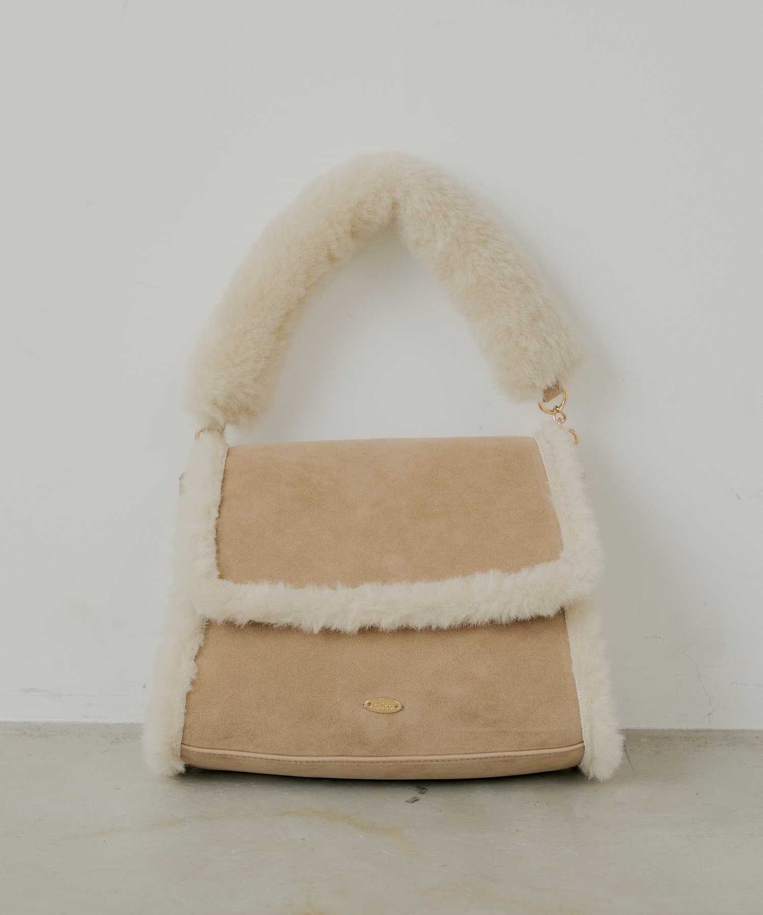 Chico(チコ) ファーハンドルフラップバッグ