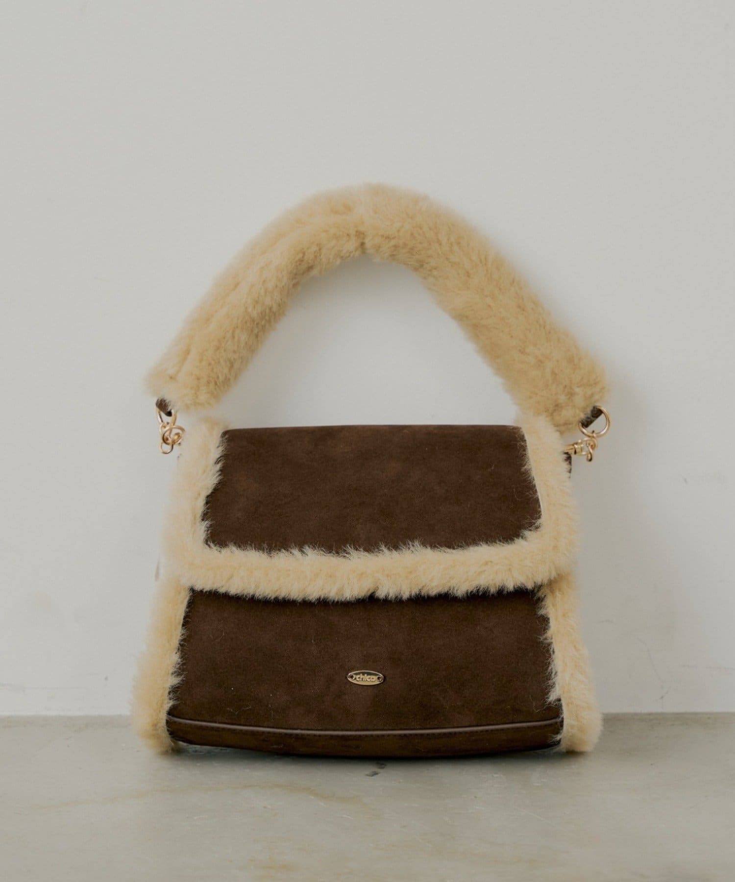Chico(チコ) ファーハンドルフラップバッグ
