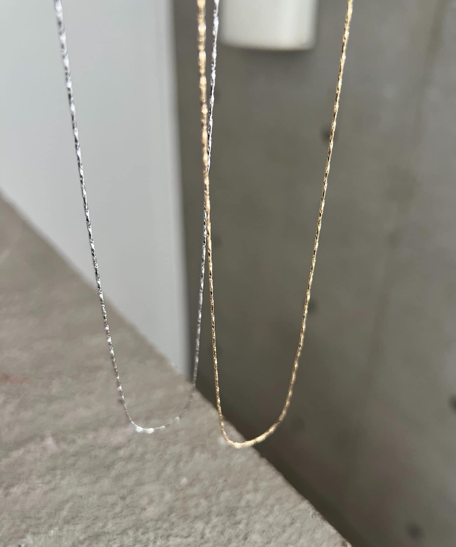 CAPRICIEUX LE'MAGE(カプリシュレマージュ) 〈GOLDY/ゴールディ〉ツイストチェーンスキンネックレス