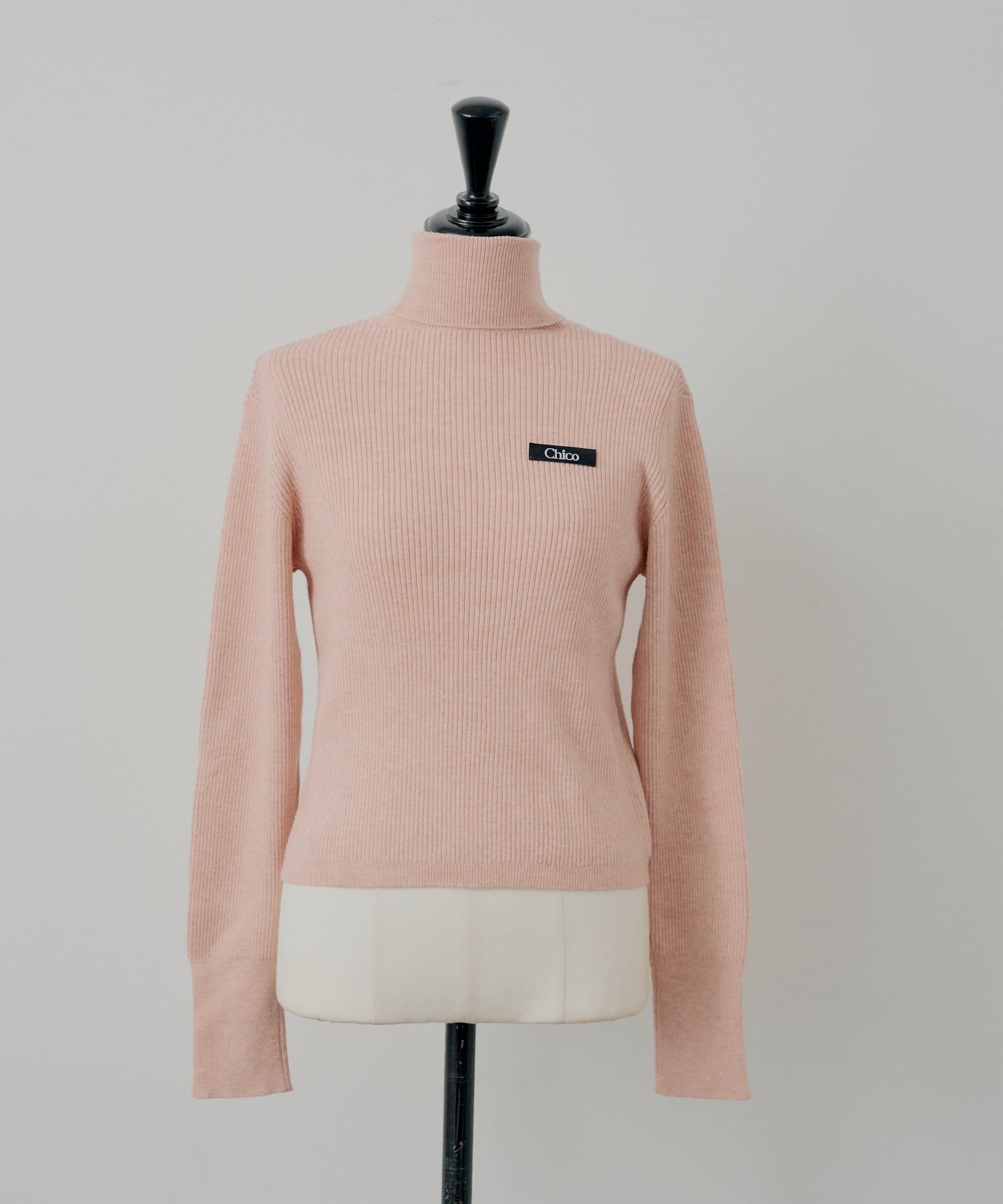 Chico(チコ) 胸ロゴラメタートルニット