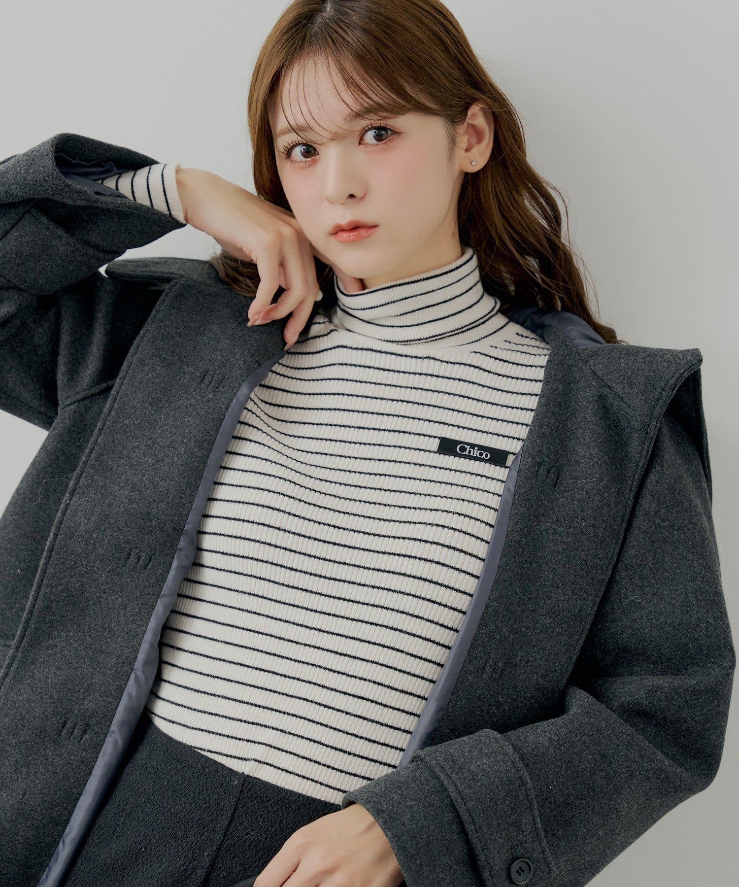 Chico(チコ) 胸ロゴラメタートルニット