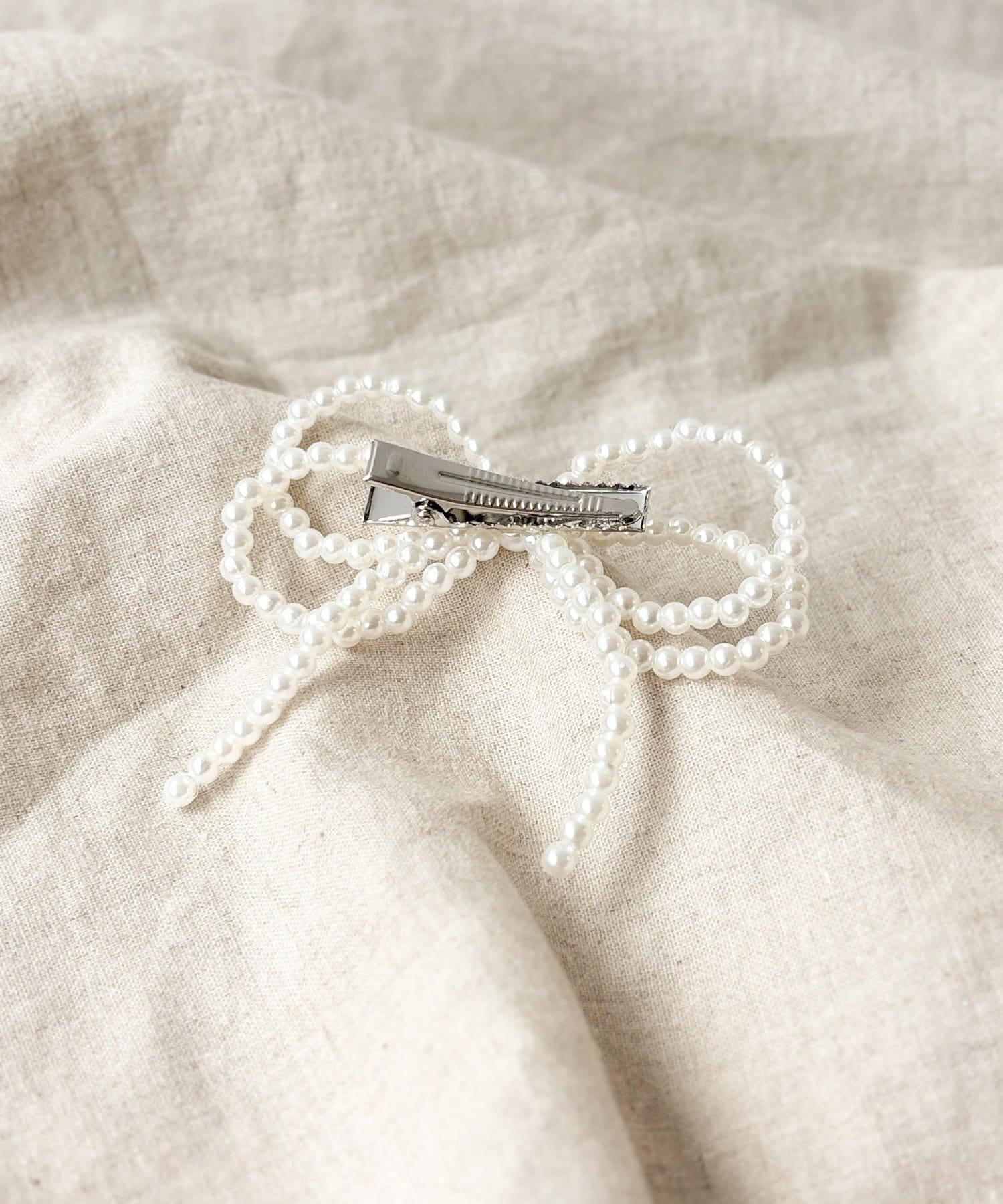 3COINS(スリーコインズ) パールリボンビッグクリップ／KIDS