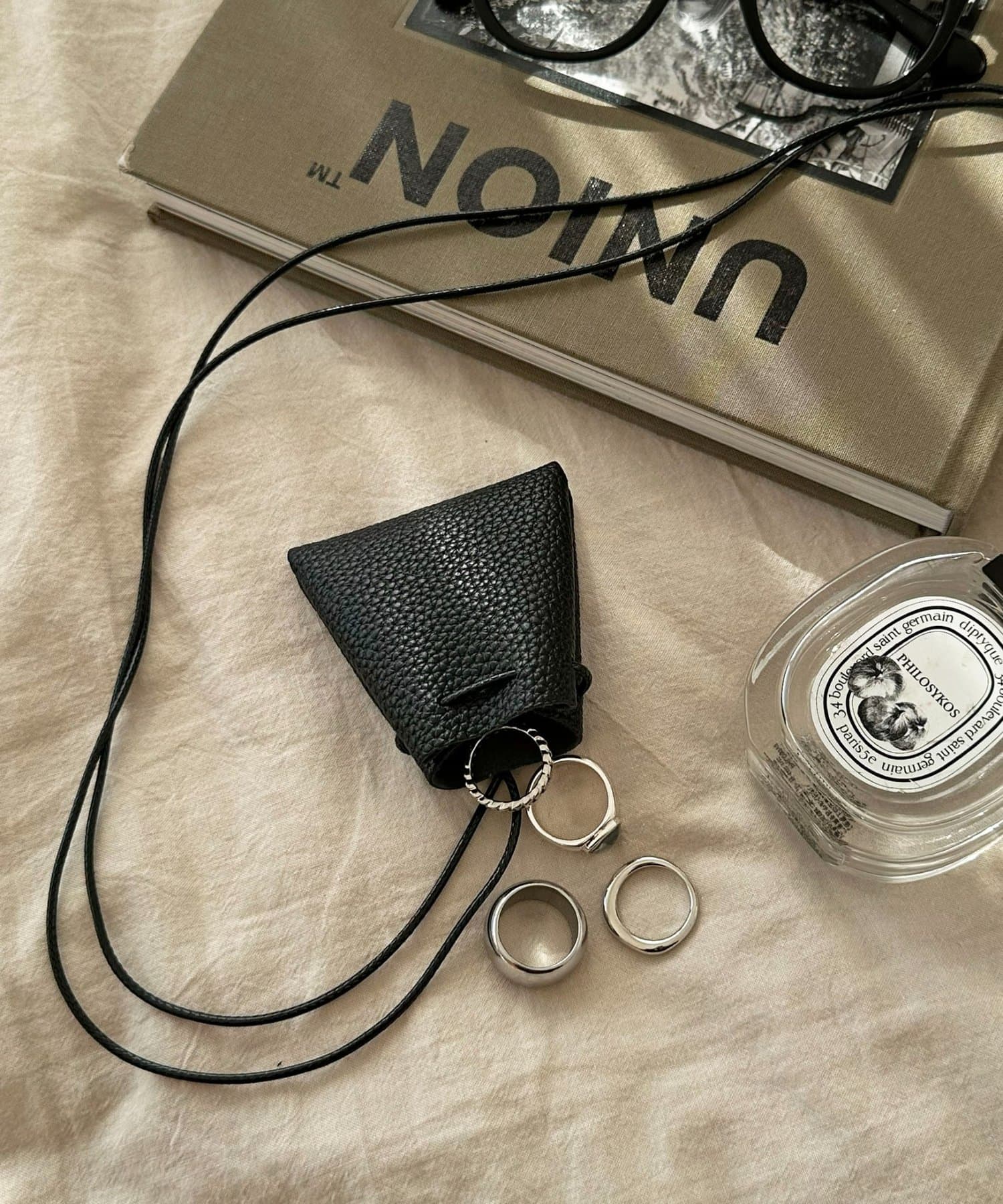 DISCOAT(ディスコート) 【Enlude】フェイクレザーミニ巾着ネックレス