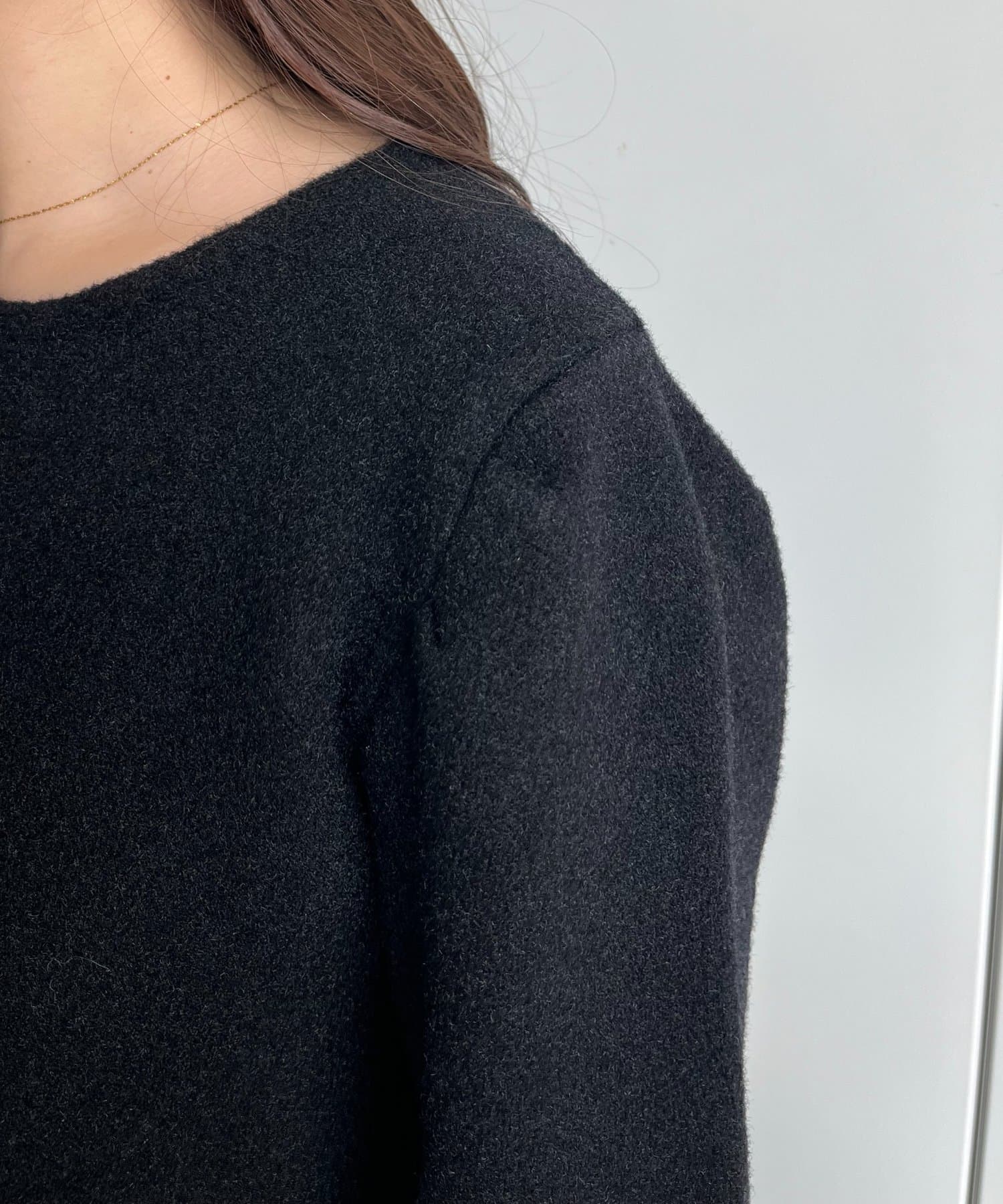 prose verse(プロズヴェール) 裾バルーンパールボタンドッキングペプラムニット