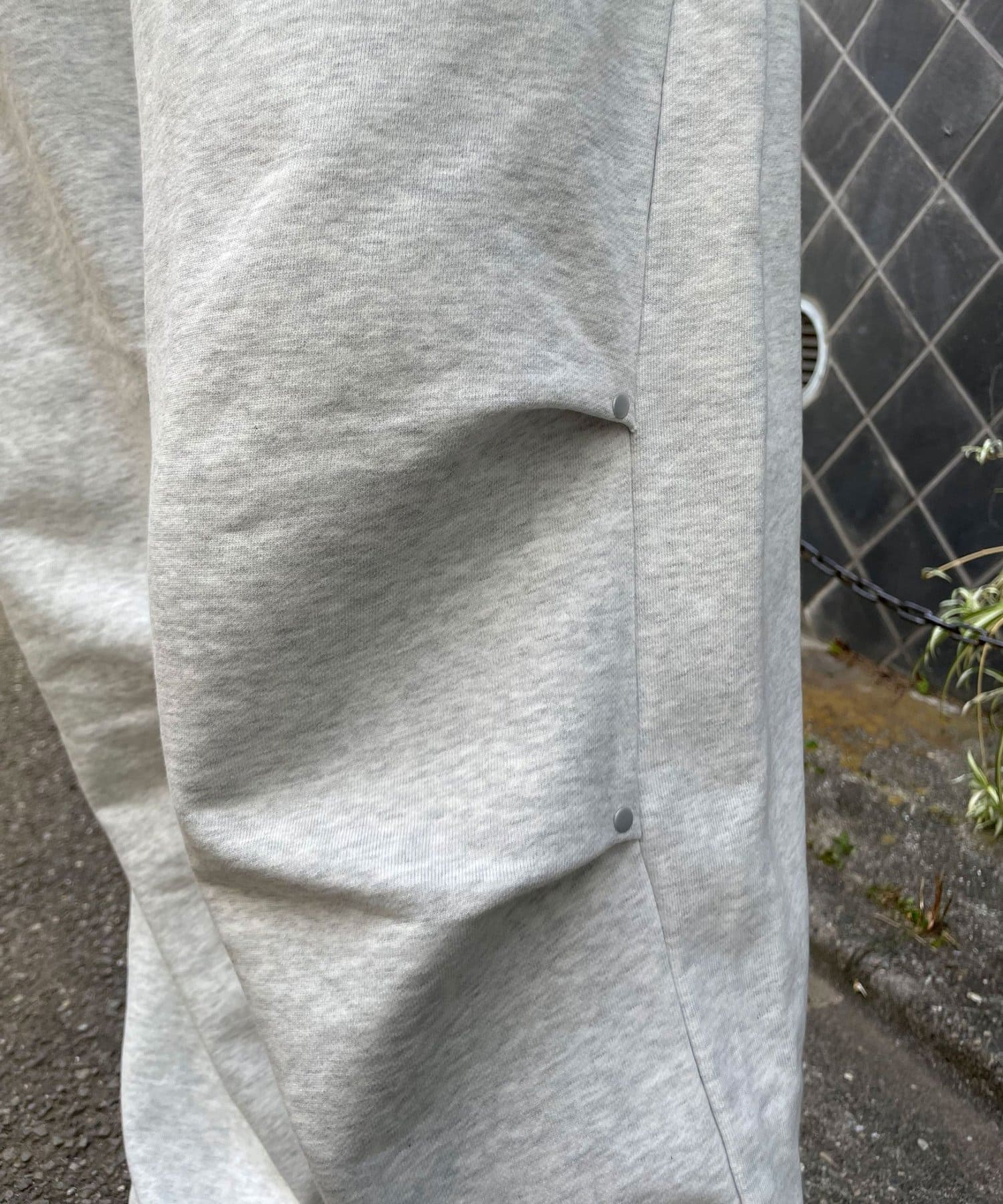 CIAOPANIC(チャオパニック) カットレイヤーロゴスタッズスウェットパンツ