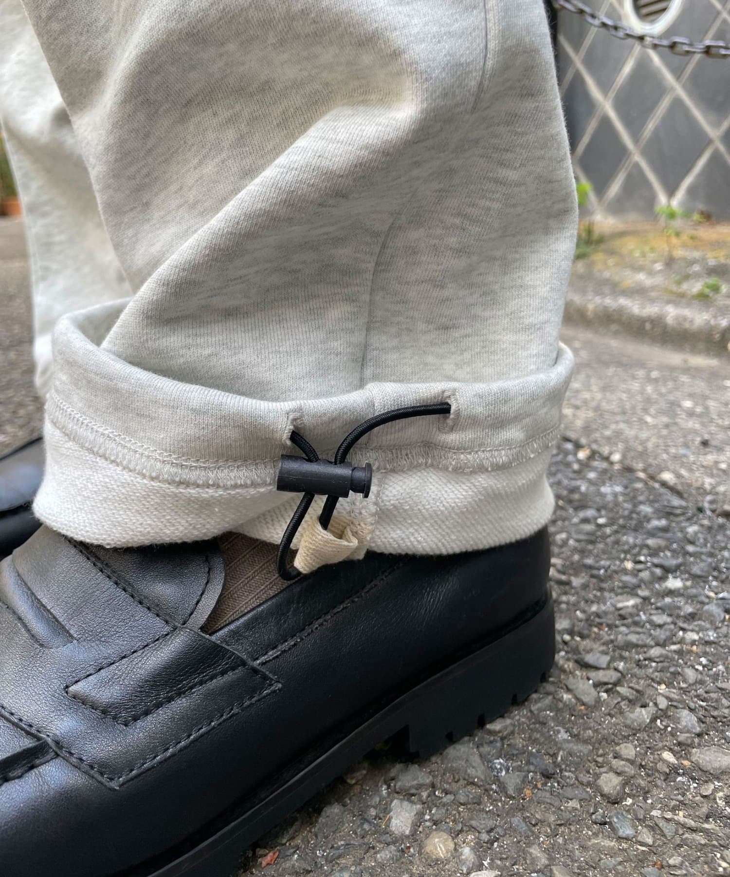 CIAOPANIC(チャオパニック) カットレイヤーロゴスタッズスウェットパンツ