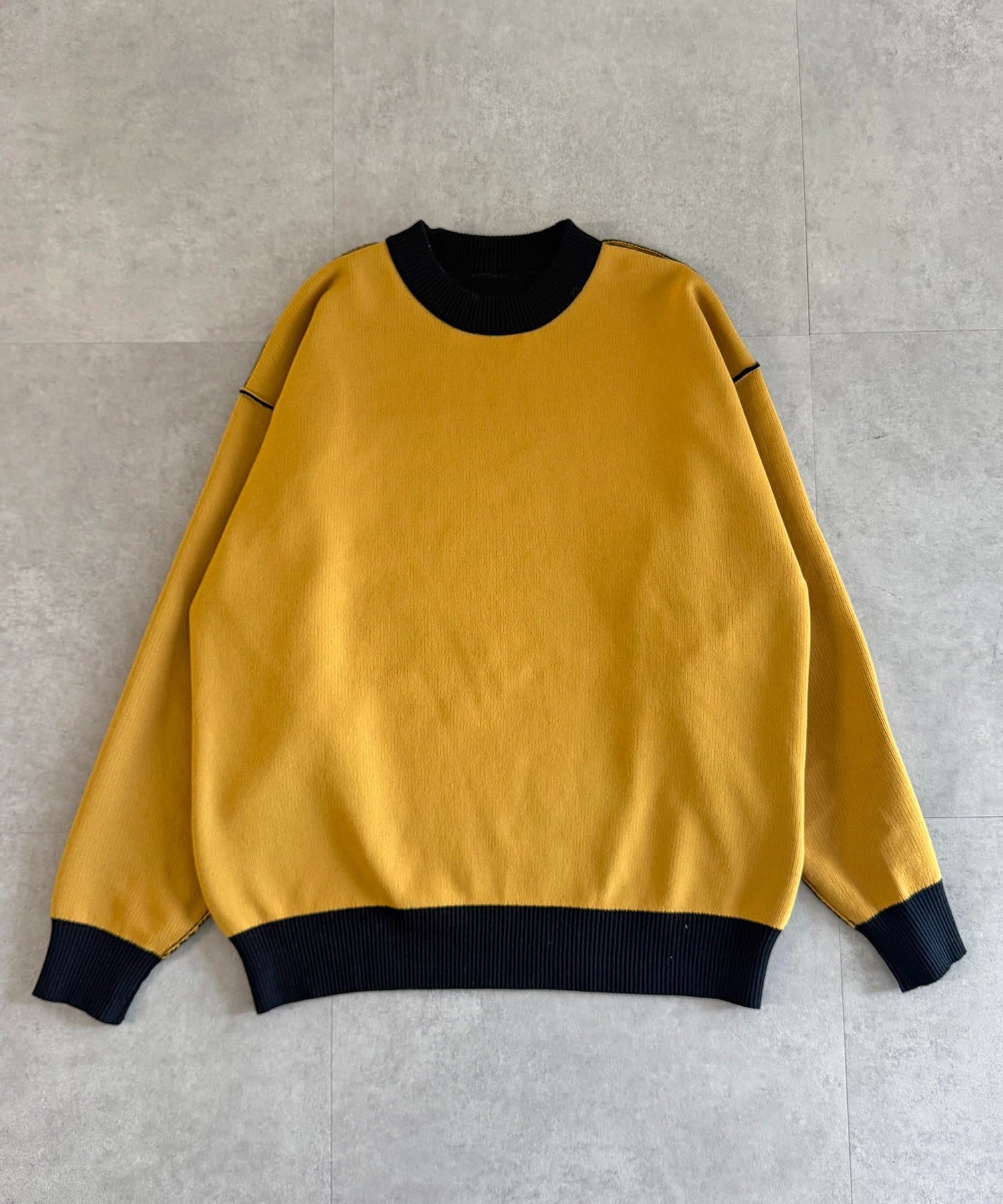 CPCM(シーピーシーエム) リバーシブル配色ロゴスウェットライクニット