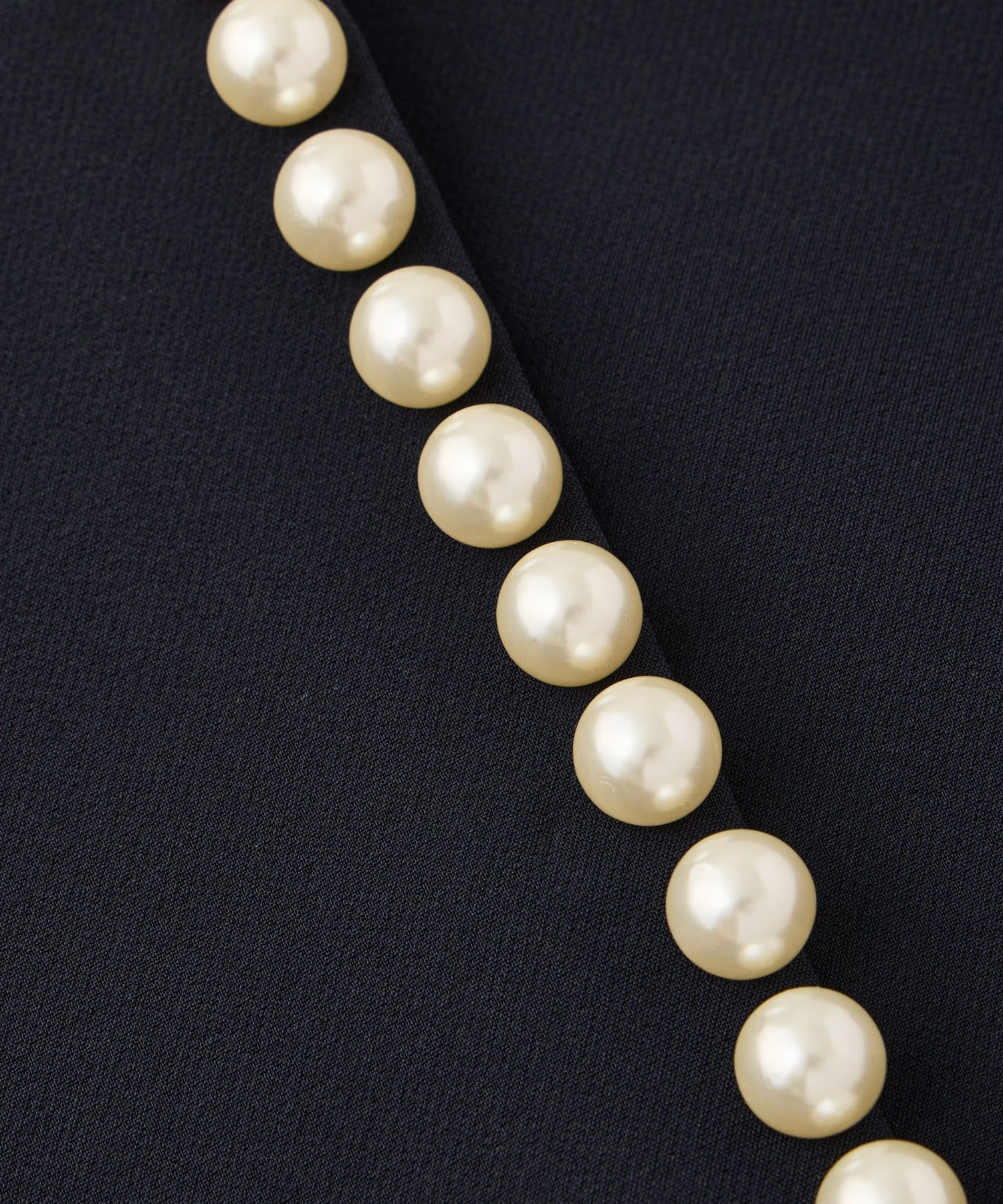 La boutique BonBon(ラブティックボンボン) ダブルクロスフロントパールジャケット