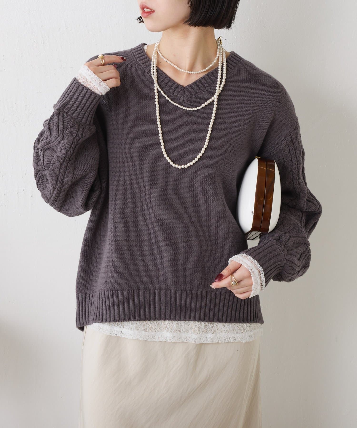 Jena　espace merveilleux(ジェナ　エスパスメルヴェイユ) 【スッキリ小顔見え◎】袖ケーブルVニット