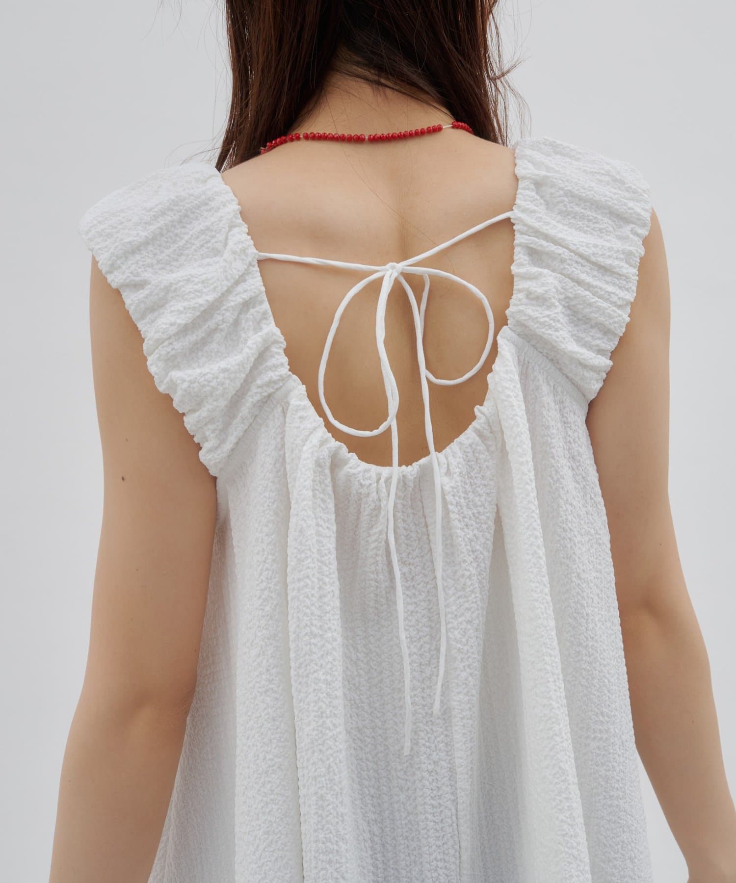 DISCOAT(ディスコート) 【umm.】肩ギャザーリボンチュニック