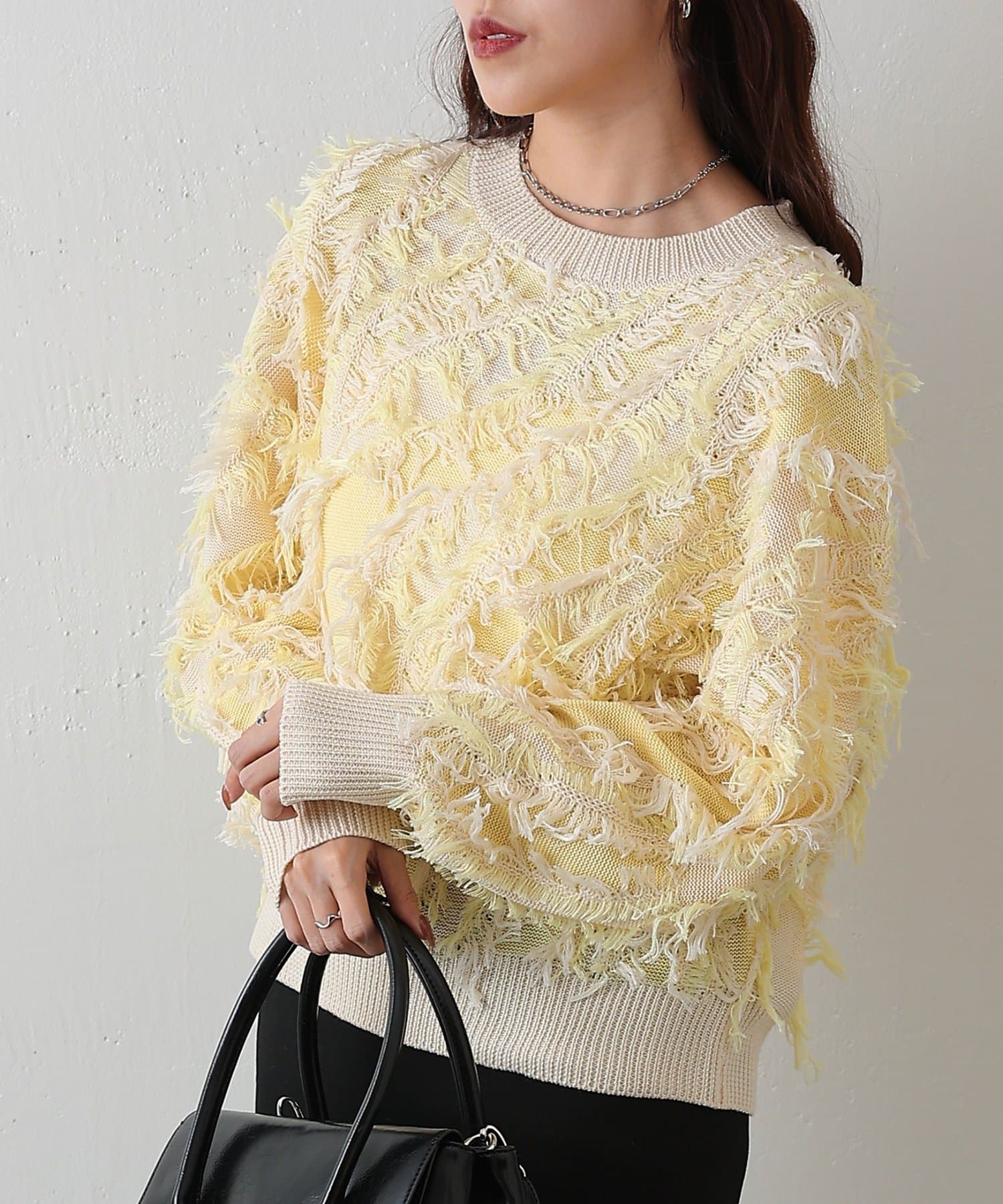 COLONY 2139(コロニー トゥーワンスリーナイン) ウェーブフリンジニットプルオーバー