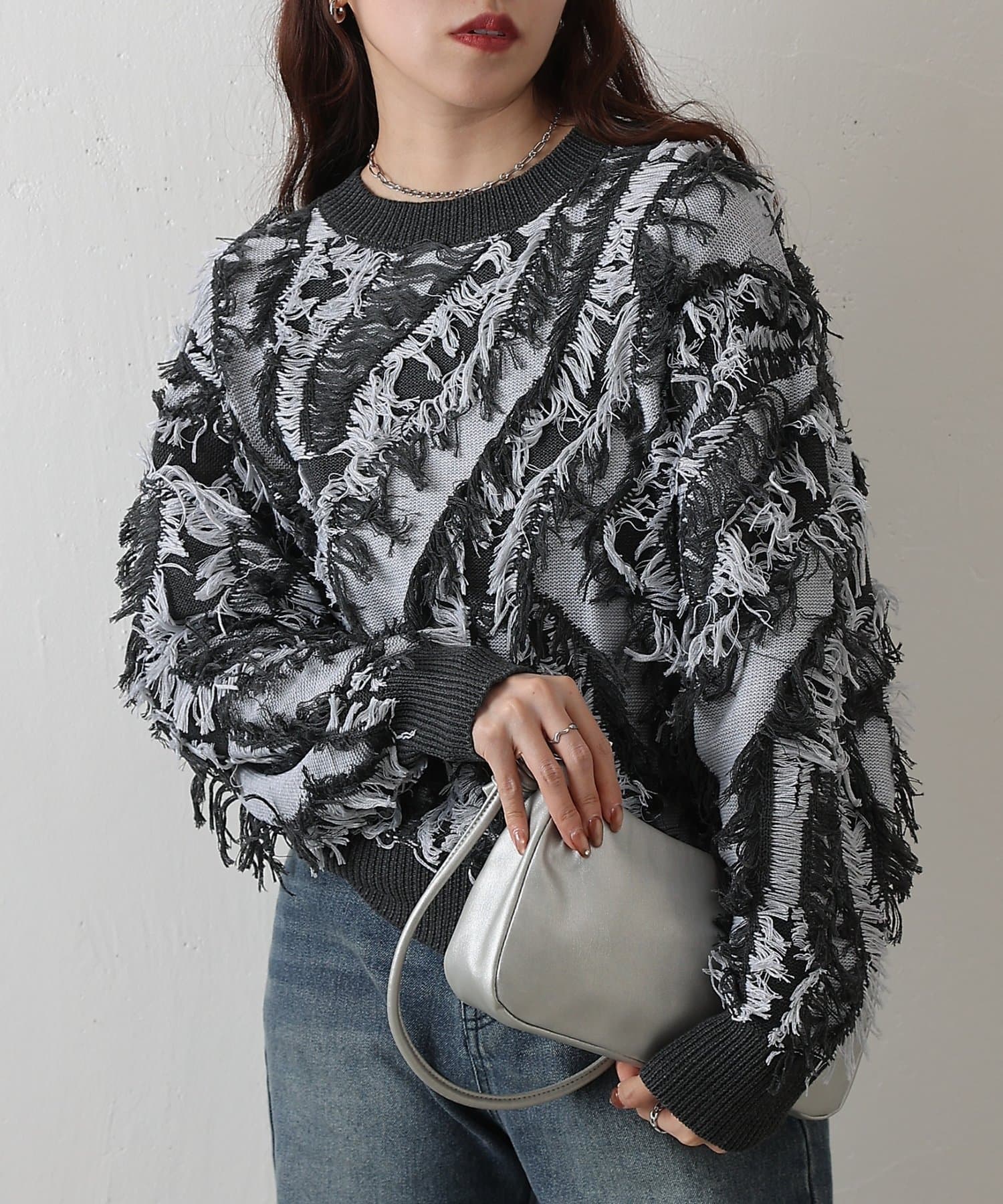 COLONY 2139(コロニー トゥーワンスリーナイン) ウェーブフリンジニットプルオーバー