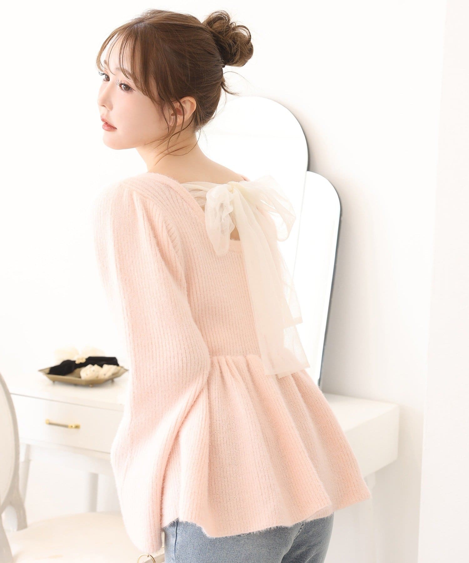 one after another NICE CLAUP(ワンアフターアナザー ナイスクラップ) バックリボンフェザーペプラムニット