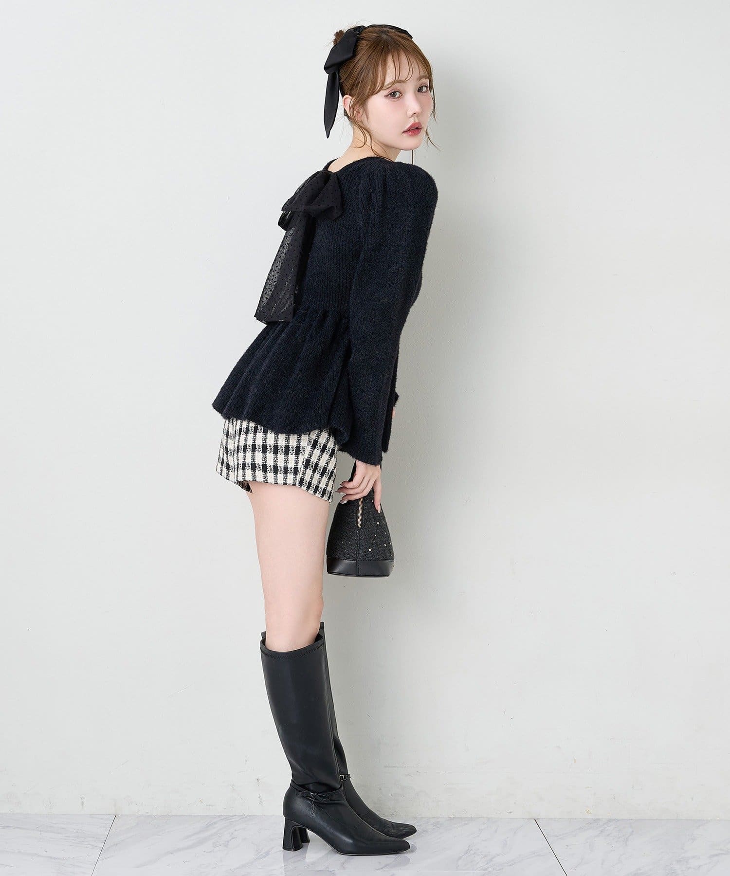 one after another NICE CLAUP(ワンアフターアナザー ナイスクラップ) バックリボンフェザーペプラムニット