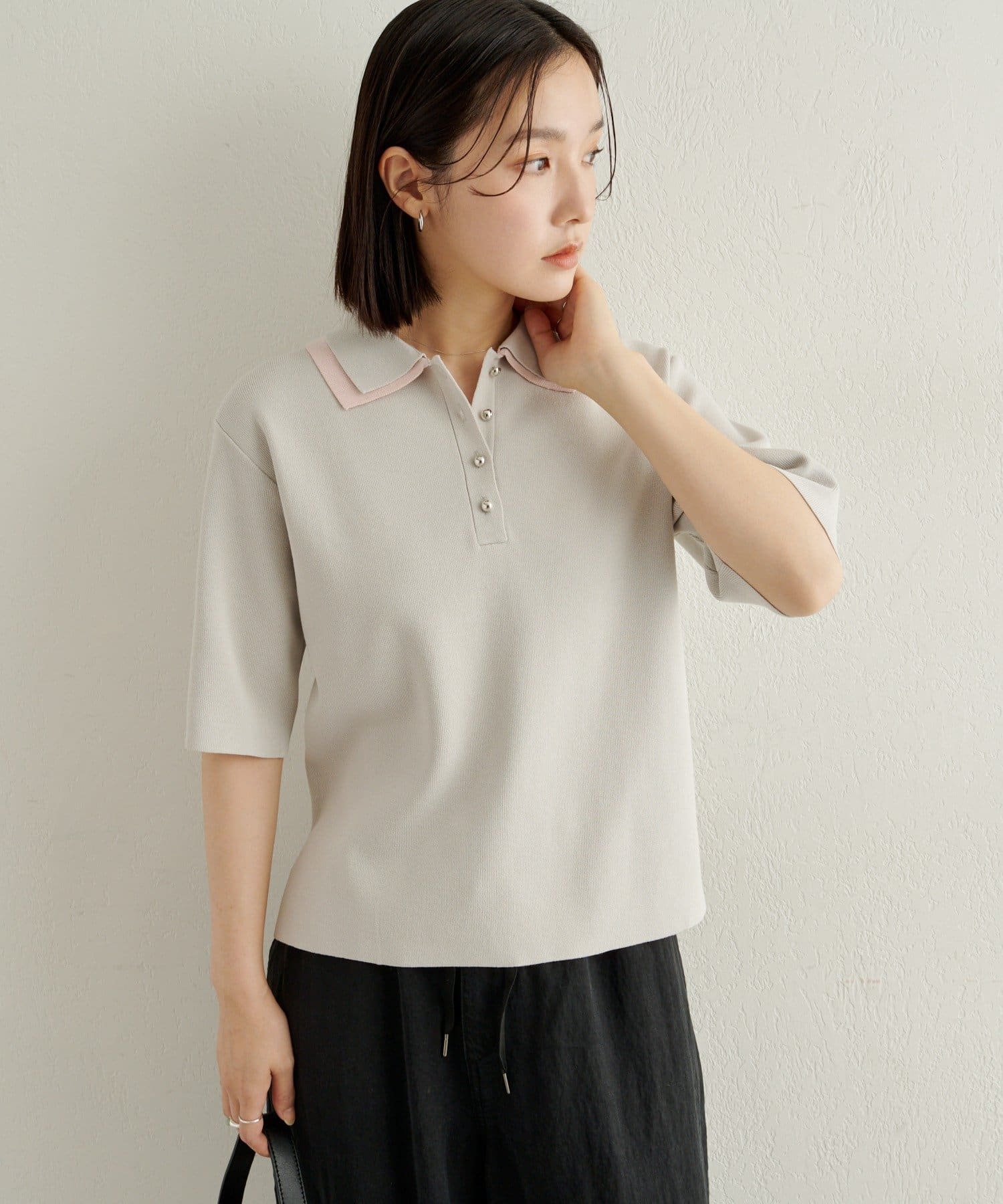 Omekashi(オメカシ) バイカラーポロニット