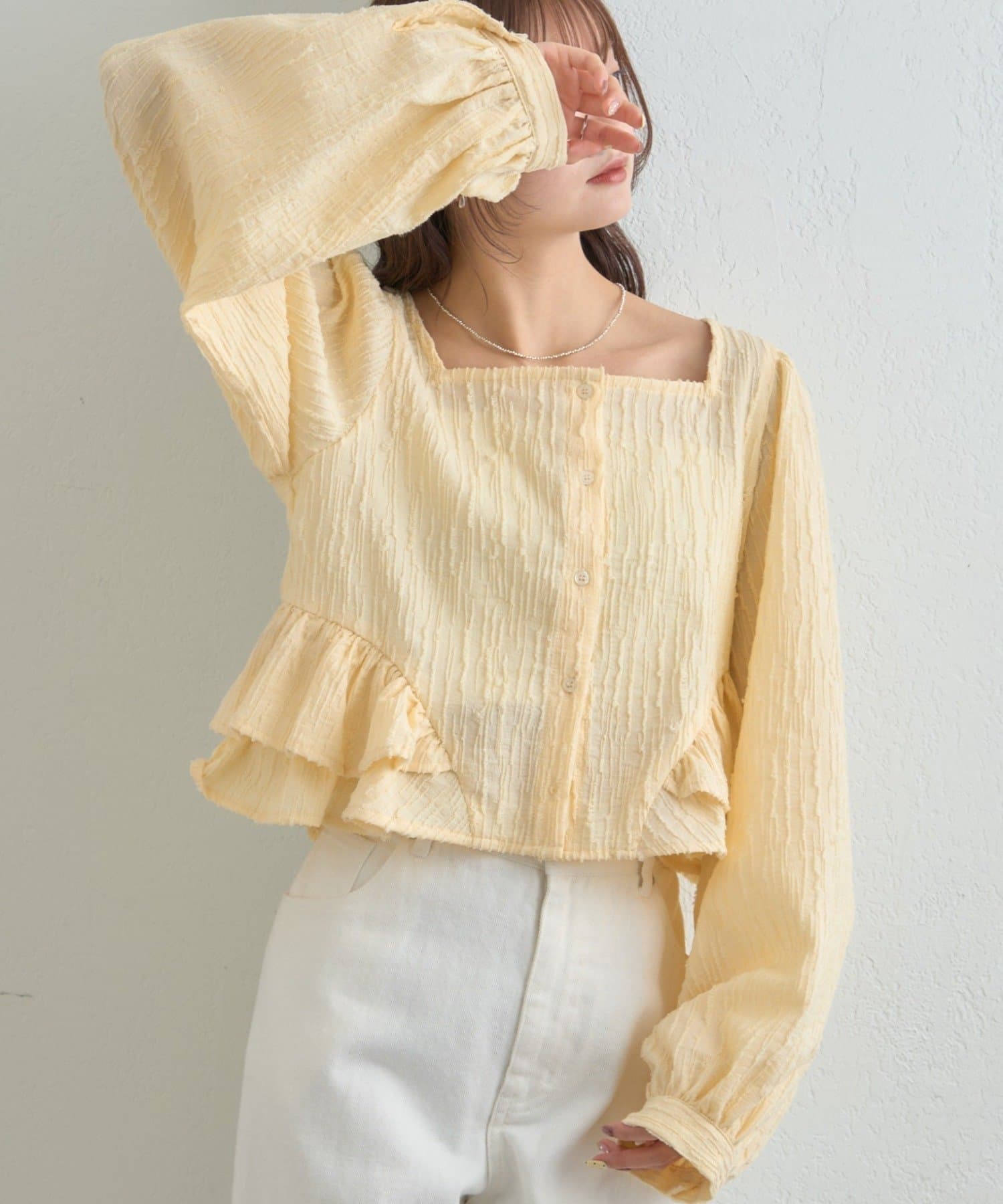 mystic(ミスティック) ジャガード裾フリルブラウス