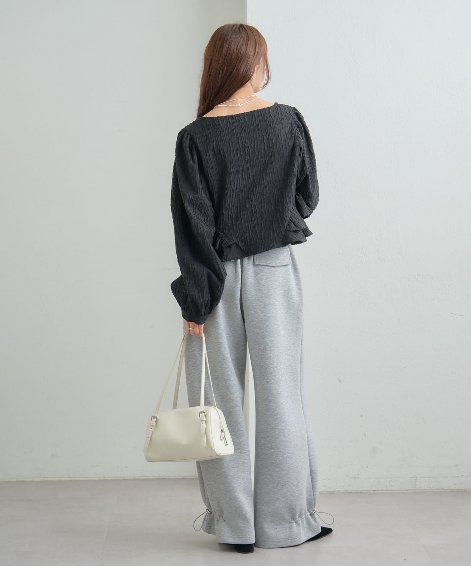 mystic(ミスティック) ジャガード裾フリルブラウス