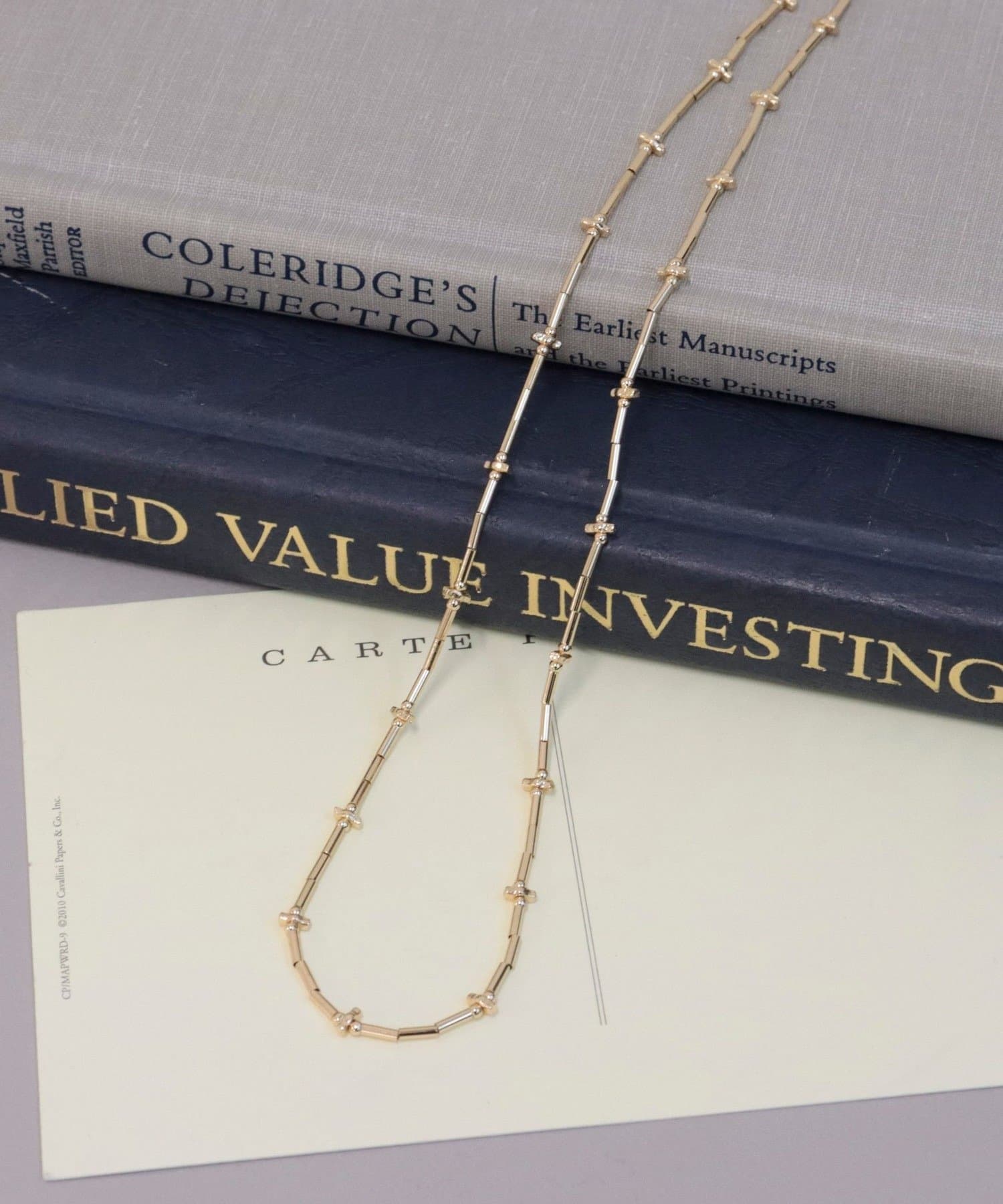 FREDY & GLOSTER(フレディ アンド グロスター) クロスビーズミドルネックレス